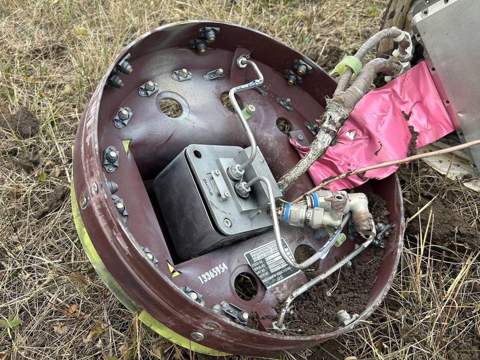 This photo released by Russian Defense Ministry official Telegram channel on Tuesday, Nov. 26, 2024, shows a fragment of a missile fired by Ukraine at the territory of Kursk airport in Russia. (Russian Defense Ministry Official Telegram Channel via AP)