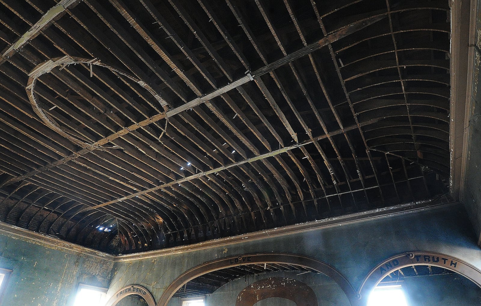 Ben Sutherly gives a tour Wednesday, Feb. 14, 2024 inside of controversial Troy Tavern building, which the Troy Historic Preservation Society is trying to save. MARSHALL GORBY\STAFF