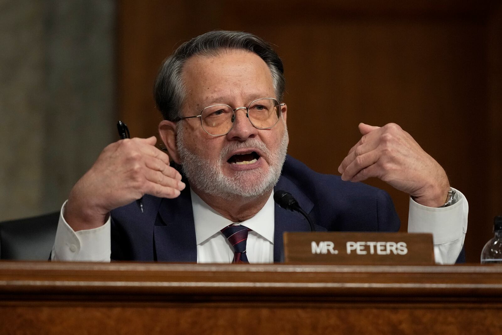 Sen. Gary Peters, D-Mich., speaks during the Senate Armed Services Committee confirmation hearing for Pete Hegseth, President-elect Donald Trump's choice to be Defense secretary, at the Capitol in Washington, Tuesday, Jan. 14, 2025. (AP Photo/Ben Curtis)