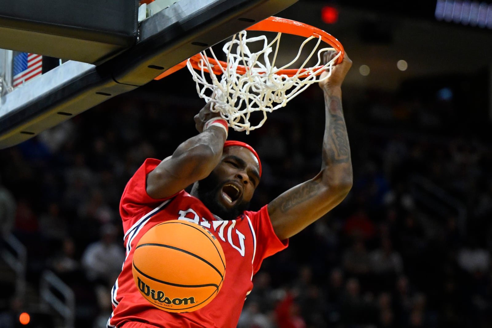 Robert Morris guard Amarion Dickerson (3) dunks in the first half against Alabama in the first round of the NCAA college basketball tournament, Friday, March 21, 2025, in Cleveland. (AP Photo/David Richard)