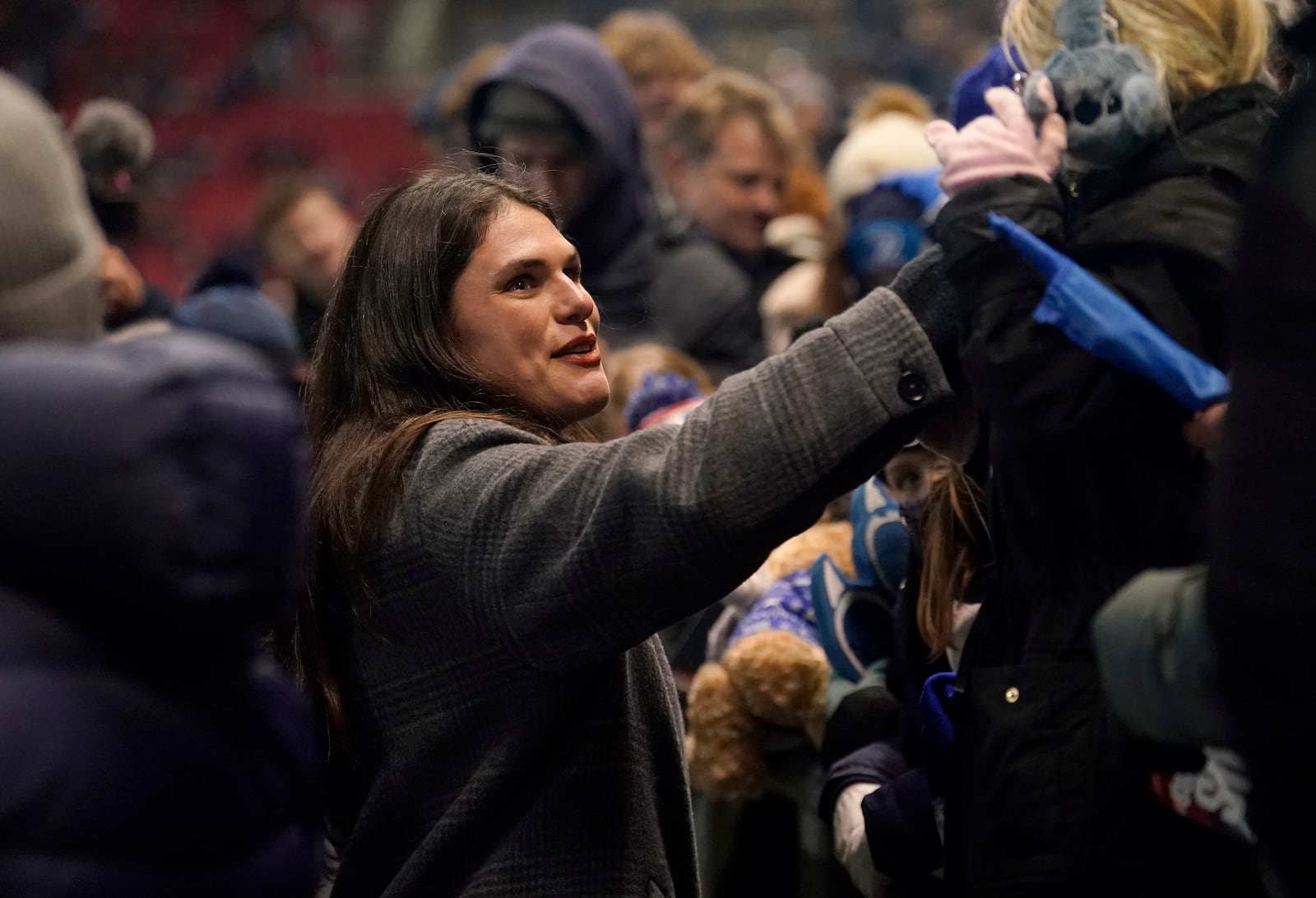 Bristol Bears' Ilona Maher greets members of the crowd at half time during the Champions Cup rugby union match at Ashton Gate, Bristol, England, Sunday Dec. 8, 2024. (Andrew Matthews/PA via AP)