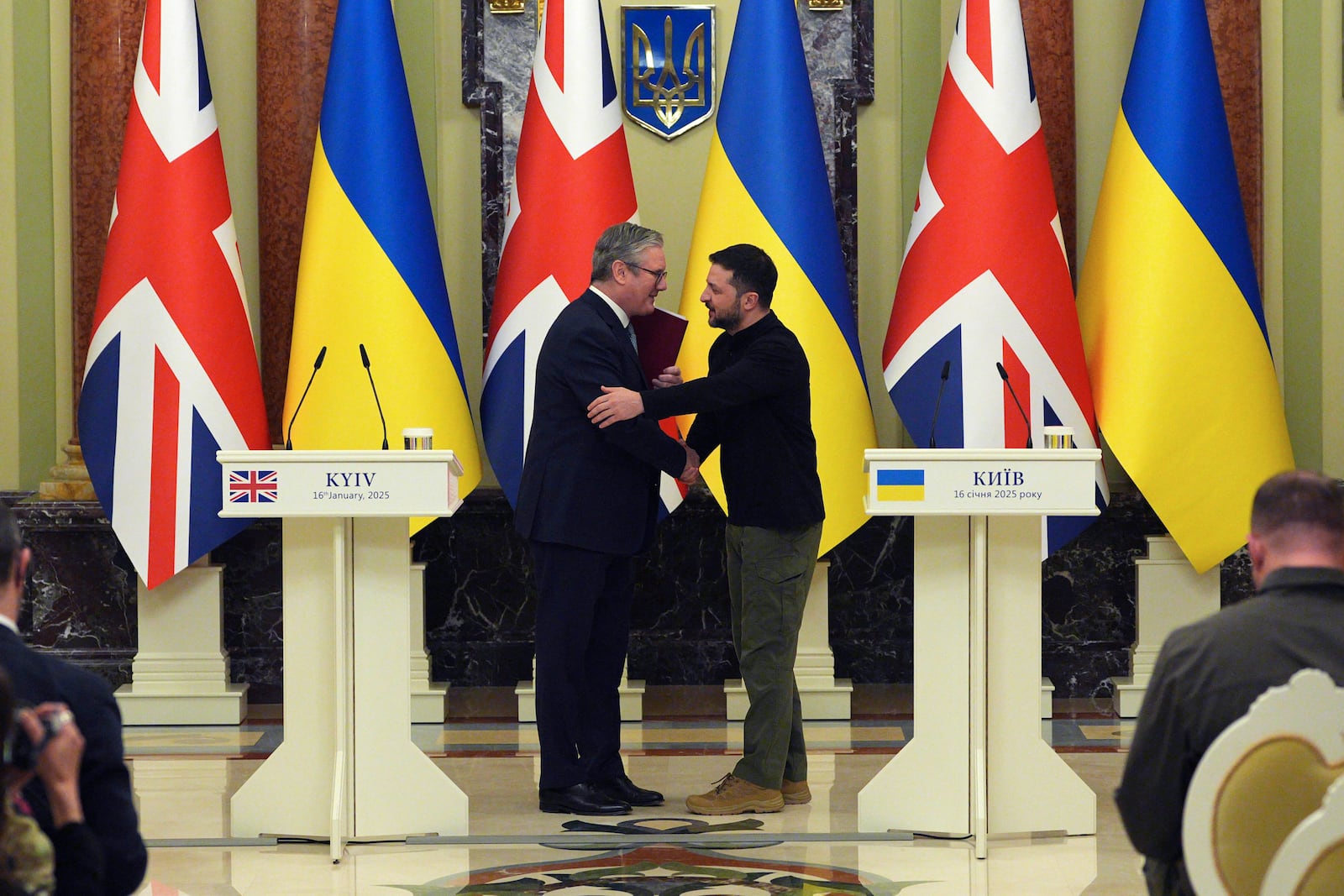 British Prime Minister Keir Starmer, left and Ukrainian President Volodymyr Zelenskyy shake hands, at the start of their bilateral talks at Mariinskyi Palace, in Kyiv, Ukraine Thursday, Jan. 16, 2025. (Carl Court/Pool Photo via AP)