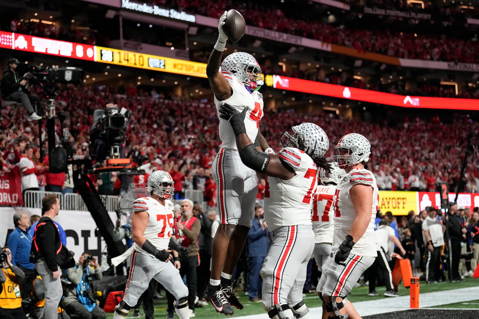 Ohio State wide receiver Jeremiah Smith celebrates after scoring against Notre Dame during first half of the College Football Playoff national championship game Monday, Jan. 20, 2025, in Atlanta. (AP Photo/Brynn Anderson)