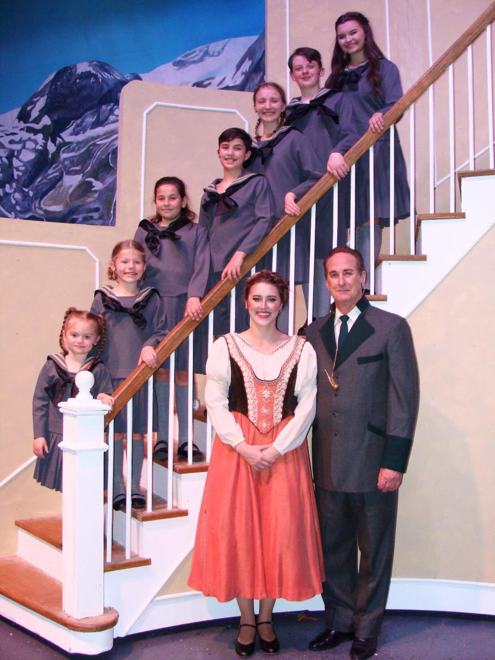 (left to right): Von Trapp Children Adilynn Hatton (Gretl), Aubrey Quinn (Marta), Morgan Tracy (Brigitta), Sam Kingrey (Kurt), Addison Haines (Louisa), and Chase Gleeson (Friedrich) with Allie Haines (Maria Rainer) and Chris Kramer (Captain Georg von Trapp) in La Comedia Dinner Theatre's production of "The Sound of Music."