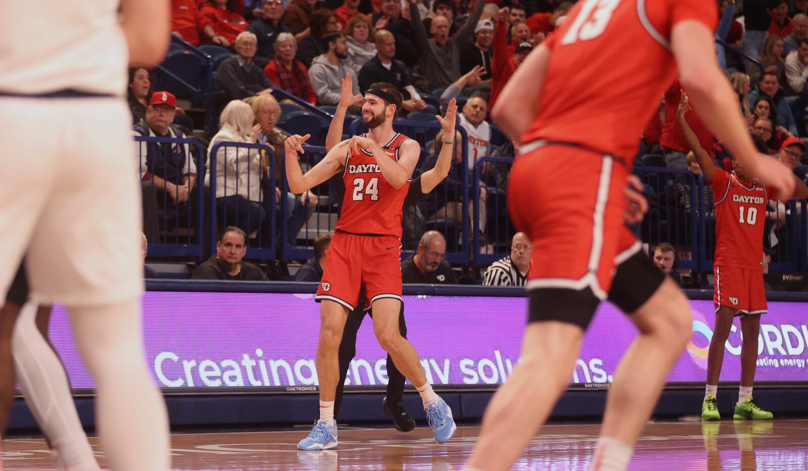 Dayton's Jacob Conner reacts after making a 3-pointer in the first half against Duquesne on Tuesday, Jan. 21, 2025, at the UPMC Cooper Fieldhouse in Pittsburgh. David Jablonski/Staff