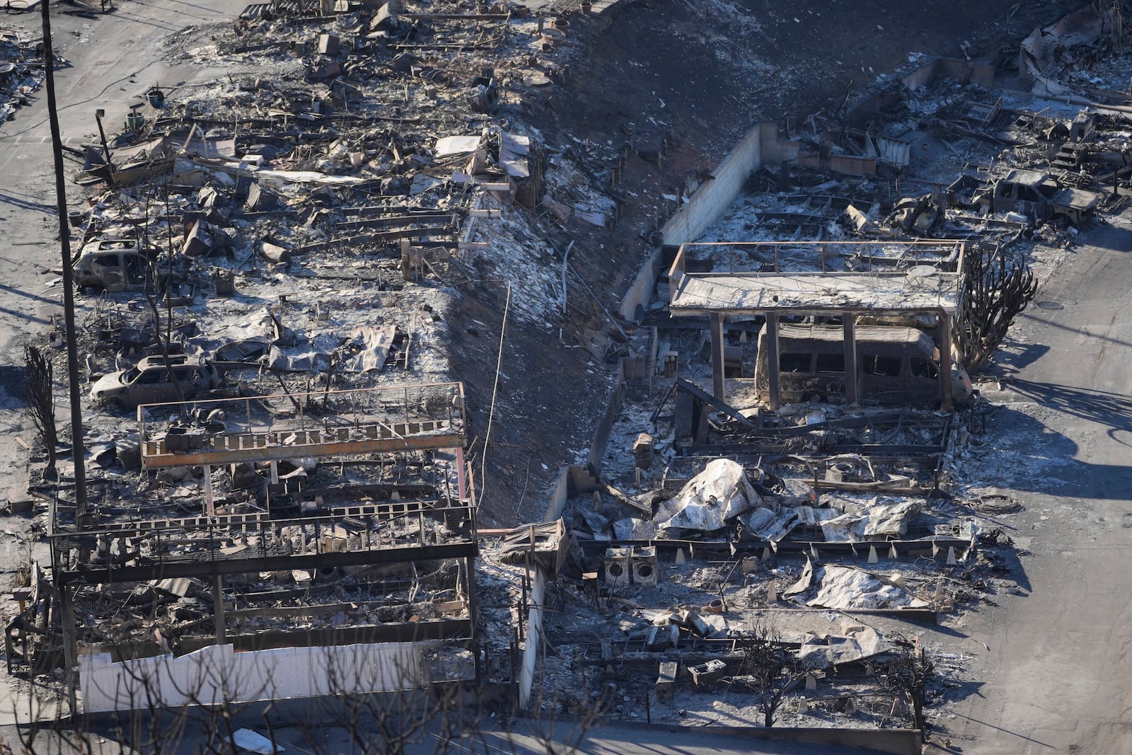 The Pacific Palisades Bowl Mobile Estates destroyed by the Palisades Fire is seen in the Pacific Palisades neighborhood of Los Angeles, Thursday, Jan. 16, 2025. (AP Photo/Damian Dovarganes)