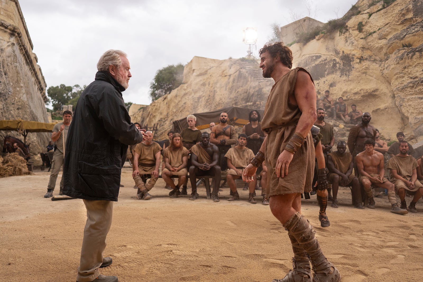 This image released by Paramount Pictures shows director Ridley Scott, left, and Paul Mescal on the set of "Gladiator II." (Aidan Monaghan/Paramount Pictures via AP)