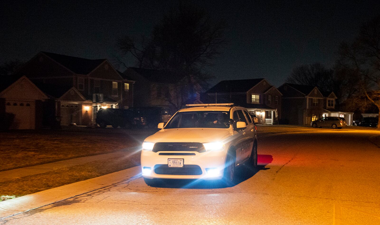 Senior Airman Aaron Benner of the 88th Security Forces Squadron conducts a drive-through patrol of base housing March 16. Security Forces are responsible for providing base defense and law enforcement on the installation. U.S. AIR FORCE PHOTO/WESLEY FARNSWORTH