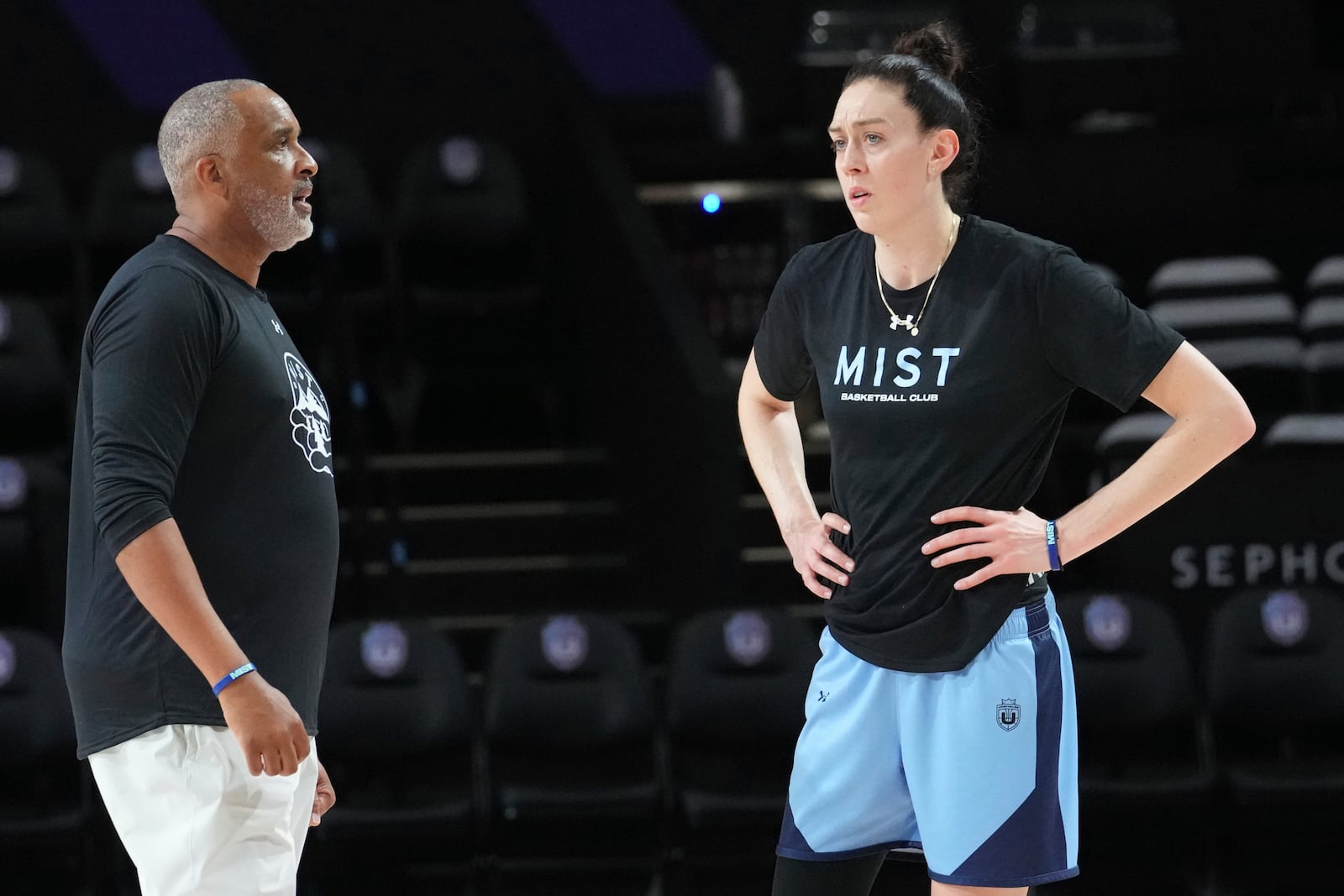 Mist player Breanna Stewart talks to head coach Phil Handy during a practice session, Thursday, Jan. 16, 2025, in Medley, Fla. (AP Photo/Marta Lavandier)