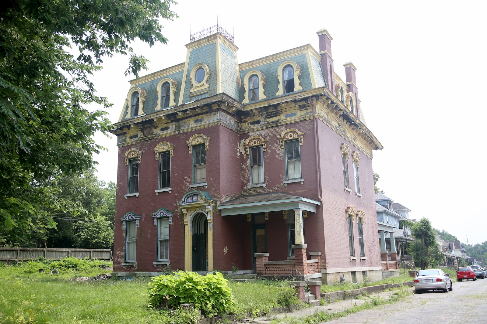 John R. Reynolds built the home in 1873 at the eastern end of the city limits on a rural hilltop with sweeping vistas of the city of Dayton.
The Montgomery County Historical Society described the 12,000 square-foot mansion as “an exemplary Midwest statement of Second Empire Architecture.”  LISA POWELL / STAFF
