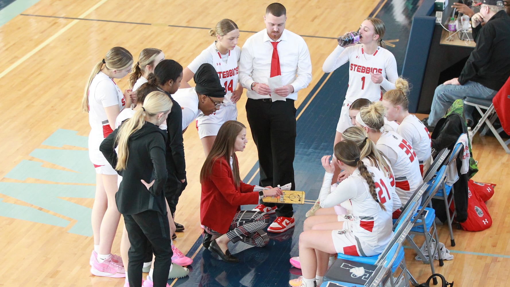 Stebbins coach Autumn Johnson huddle