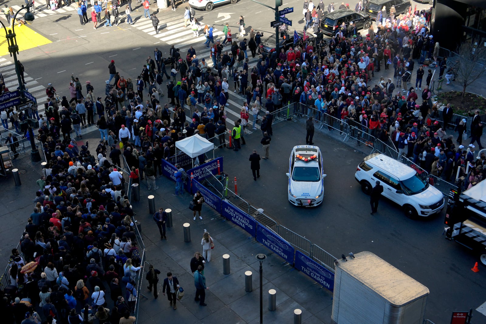 A crowd stands in line before a campaign rally for Republican presidential nominee former President Donald Trump at Madison Square Garden, Sunday, Oct. 27, 2024, in New York. (AP Photo/Julia Demaree Nikhinson)