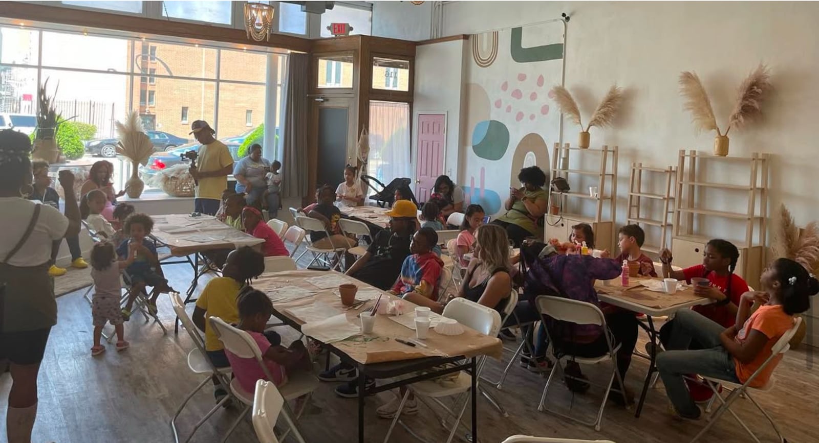 A community Earth Day event at Baba Love Organic's original storefront on Dayton's West 5th Street. Vaniti Byrd's new brick-and-mortar location will open at 200 Wayne Avenue in Spring 2025.