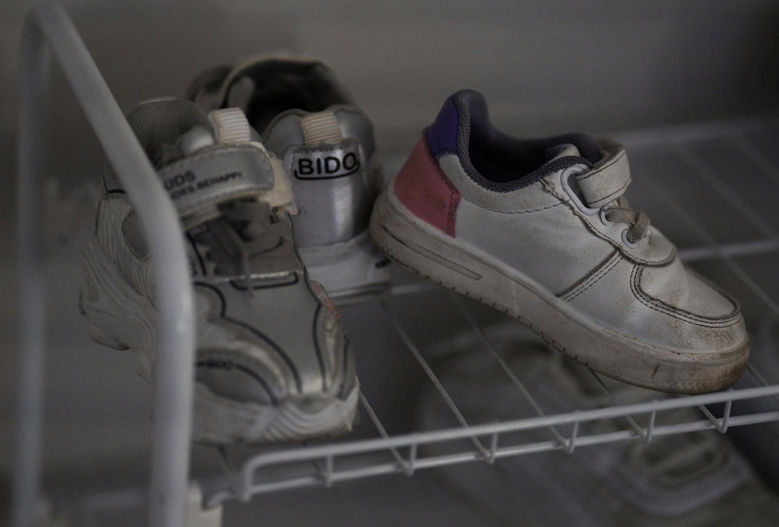 The shoes of Rahmani's daughter sit near the front door of their apartment in Laurel, Md., Monday, March 3, 2025. (AP Photo/Jessie Wardarski)