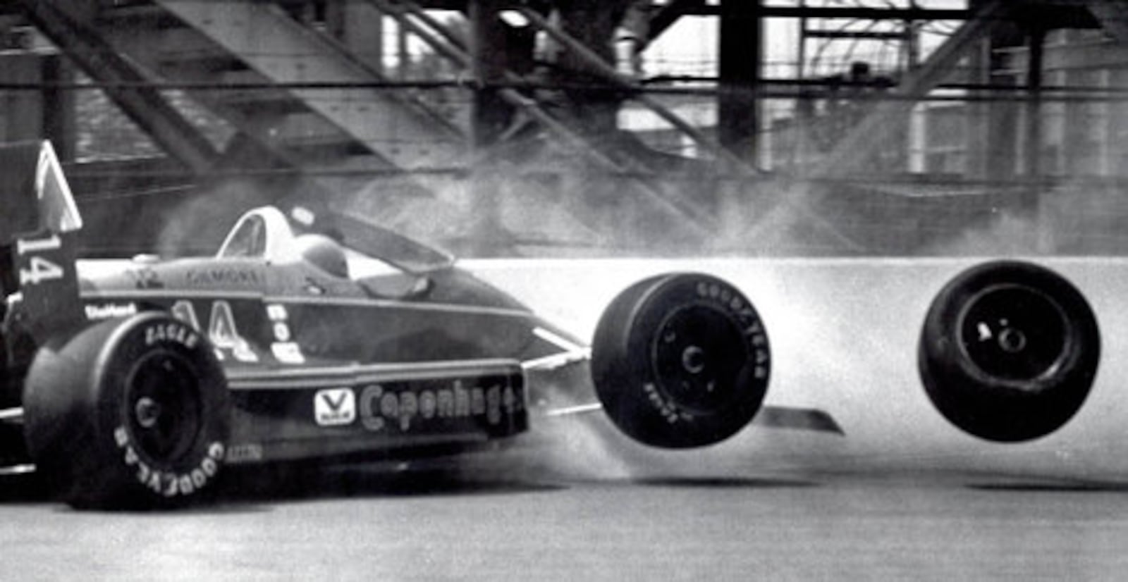 A. J. Foyt hits the wall in Turn 1 during Carburetion Day in 1987. Foyt was able to repair the car for the race.