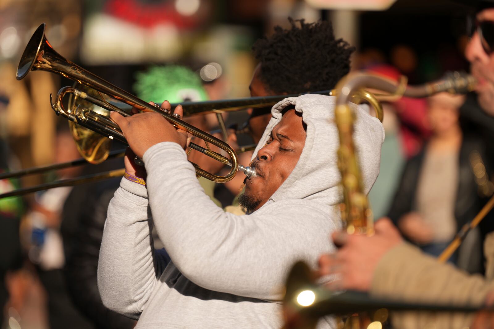 Mike Williams, of the One Way Brass Band, performs on Bourbon Street, Thursday, Jan. 2, 2025 in New Orleans. (AP Photo/George Walker IV)