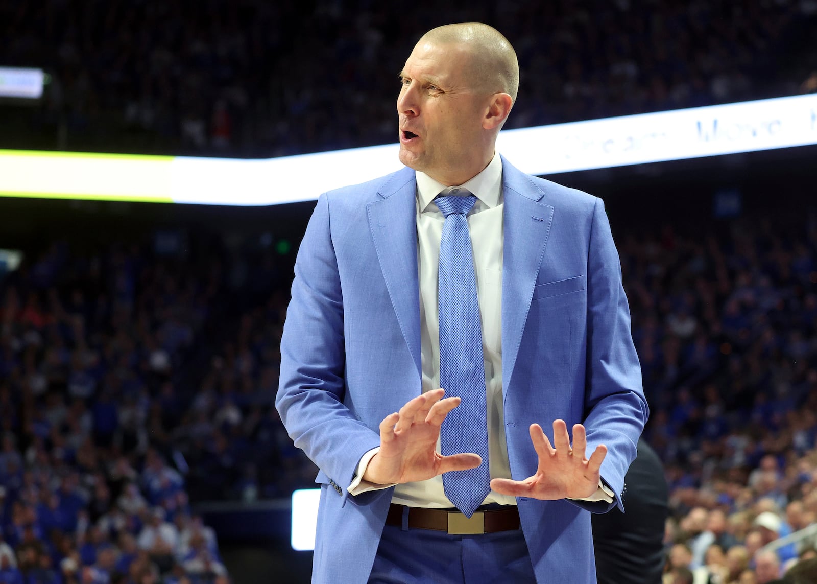 Kentucky head coach Mark Pope questions a call during the second half of an NCAA college basketball game against Louisville in Lexington, Ky., Saturday, Dec. 14, 2024. (AP Photo/James Crisp)