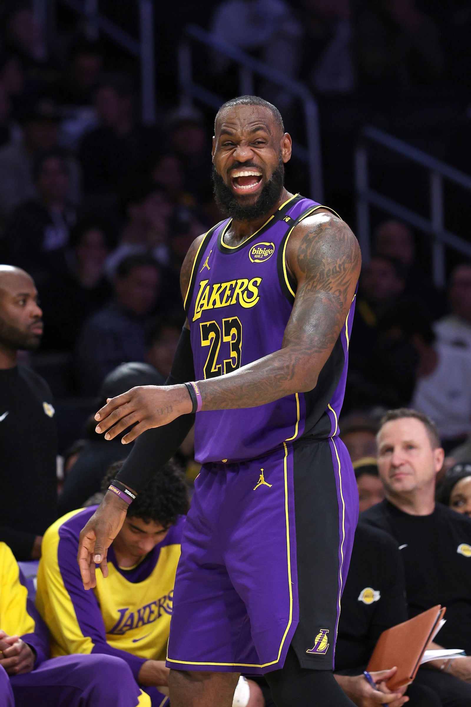 Los Angeles Lakers forward LeBron James reacts during the first half on an NBA basketball game Washington Wizards, Tuesday, Jan. 21, 2025, in Los Angeles. (AP Photo/Raul Romero Jr.)