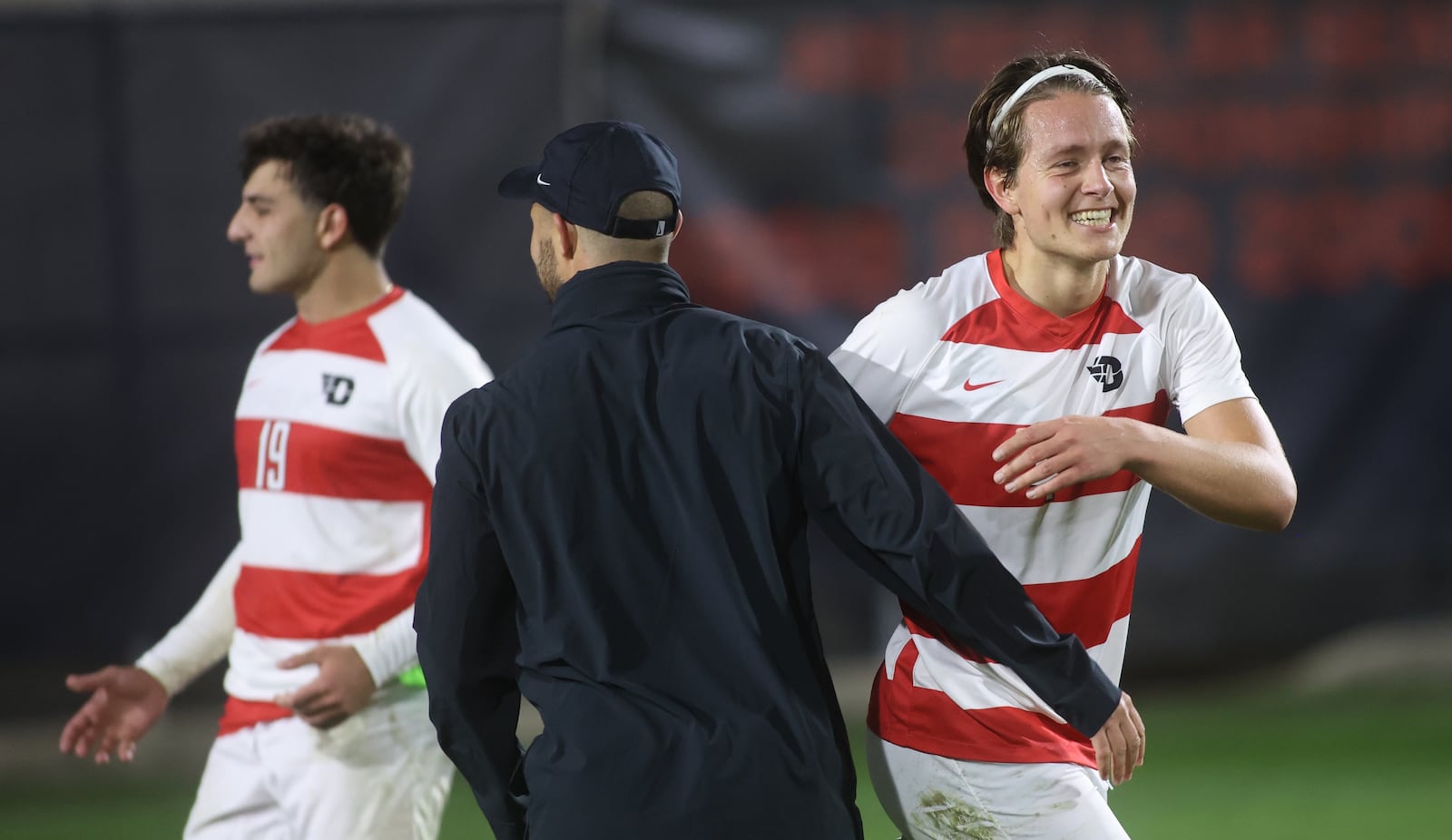 Dayton celebrates a victory against Davidson in the quarterfinals of the A-10 tournament on Friday, Nov. 8, 2024, at Baujan Field in Dayton. David Jablonski/Staff