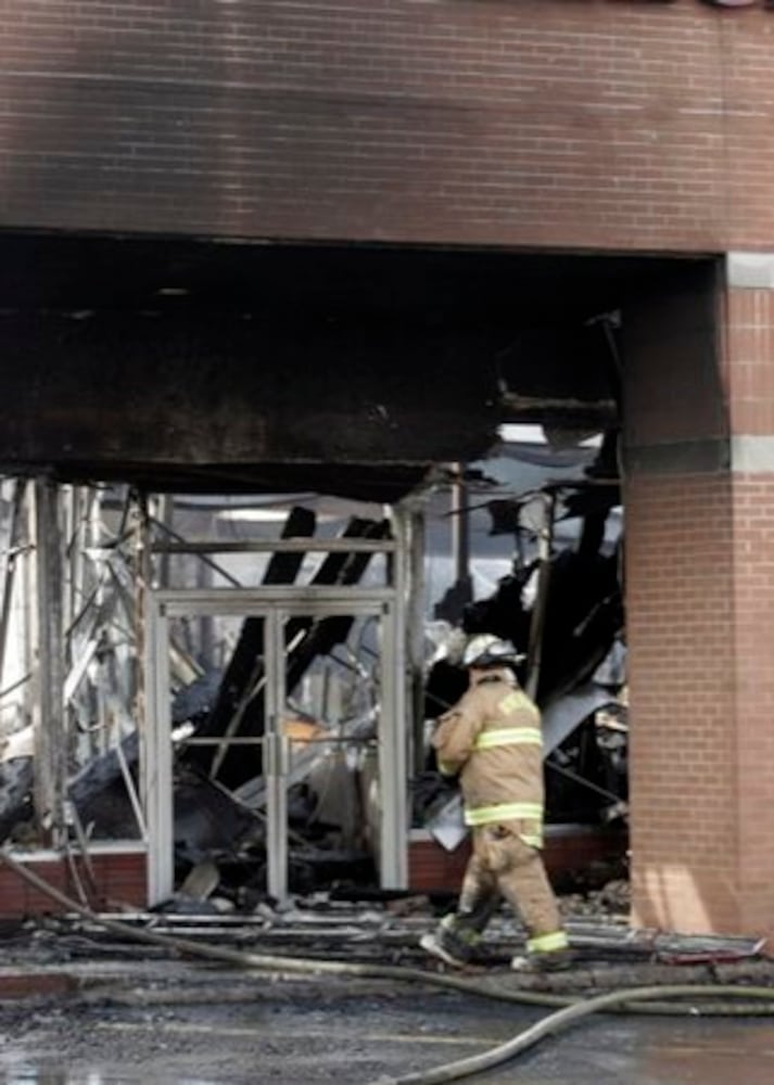 Page Manor shopping center damaged by fire