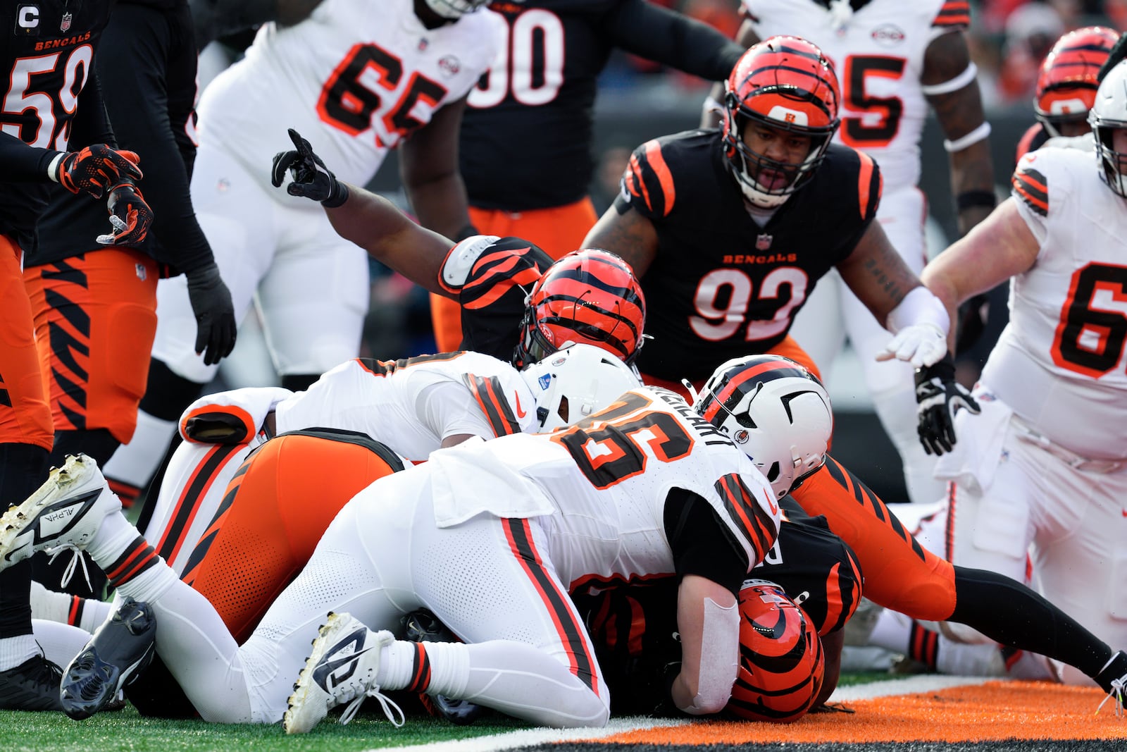 Cleveland Browns fumble the ball near the 1-yard line as Cincinnati Bengals safety Vonn Bell (24) recovers the fumble during the first half of an NFL football game, Sunday, Dec. 22, 2024, in Cincinnati. (AP Photo/Jeff Dean)