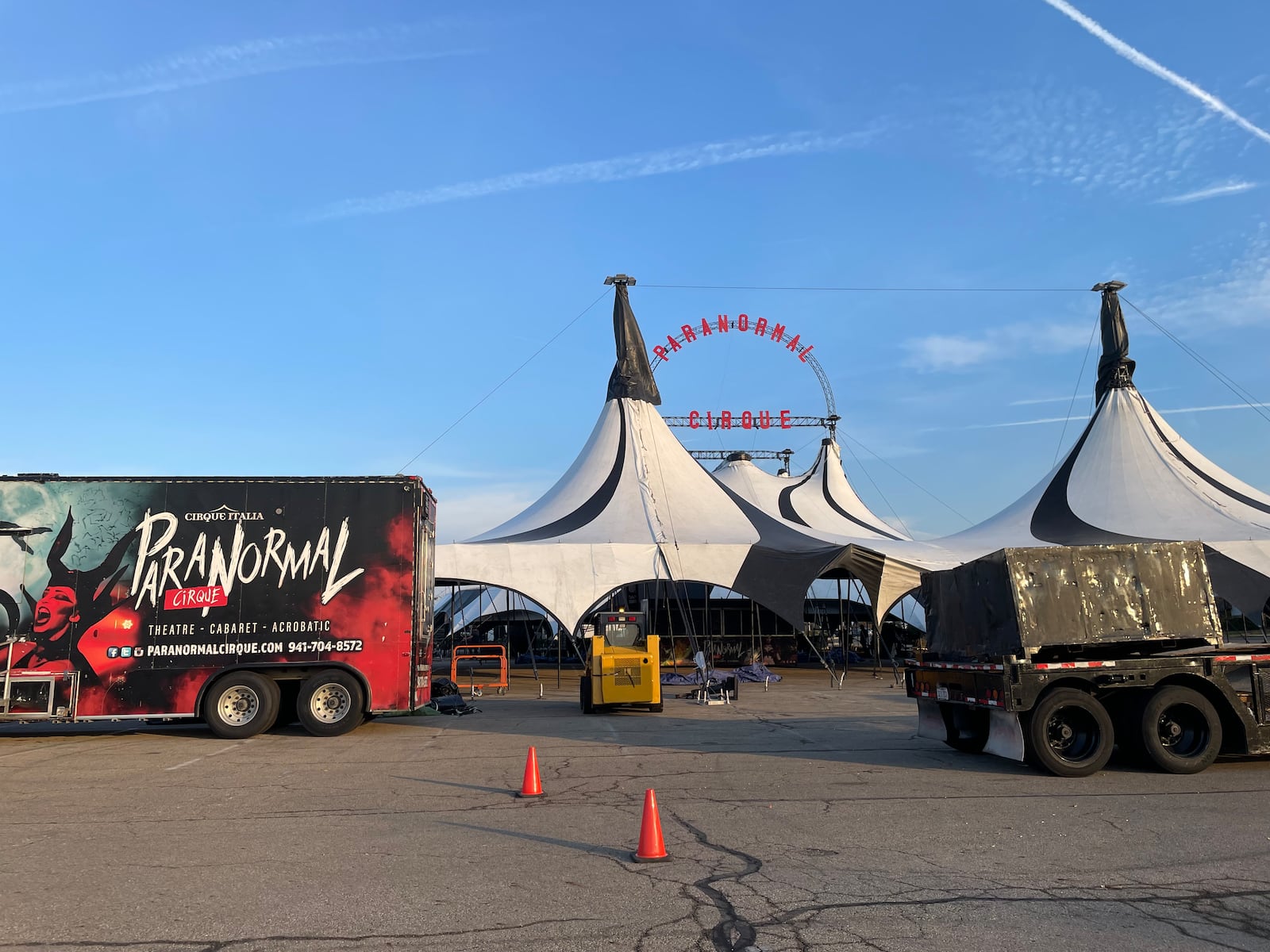 Paranormal Cirque is set up in the parking lot outside of JCPenney and across the street from Mackenzie River in Beavercreek. NATALIE JONES/STAFF