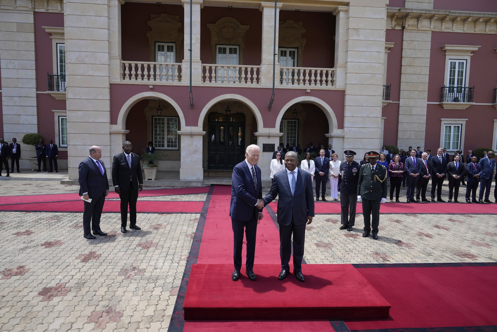 President Joe Biden shakes hand with Angola's President Joao Lourenco, at the presidential palace in the capital Luanda, Angola on Tuesday, Dec. 3, 2024. (AP Photo/Ben Curtis)