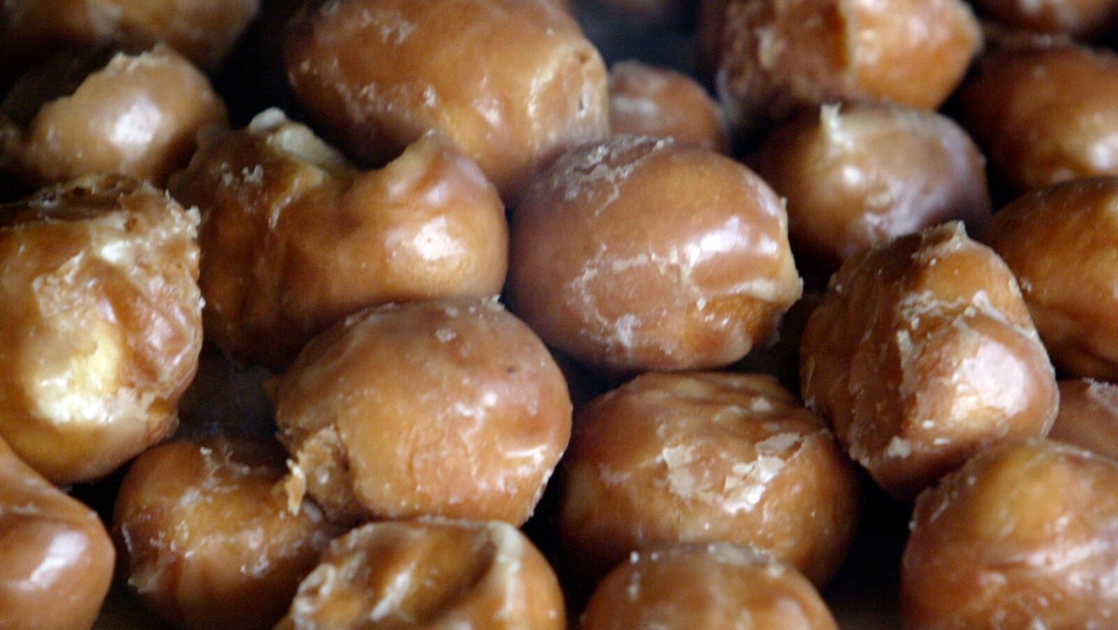 051005---Jim's Donut Shop located on the National Road Vandalia is a morning gathering place for many folks in the community from the mayor on down. The shop is open 24 hours a day.  Donut holes waiting for consumption.  STAFF PHOTO BY BILL REINKE.