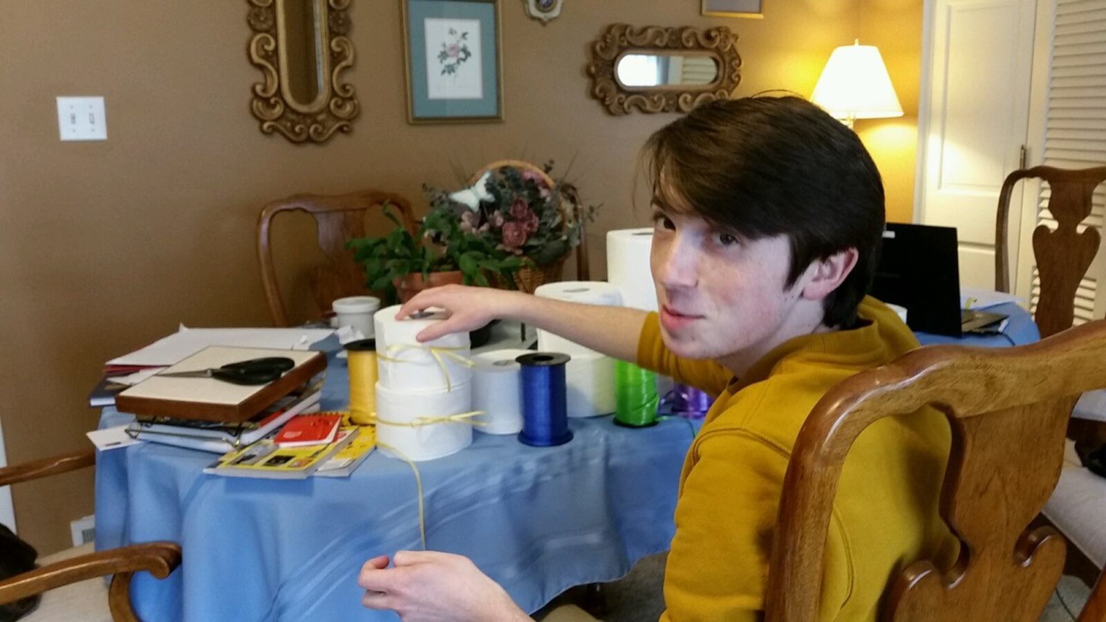 Aaron Guggenheimer of Oakwood works on a wacky Hanukkah menorah (candelabrum ) for Temple Israel’s contest. CONTRIBUTED