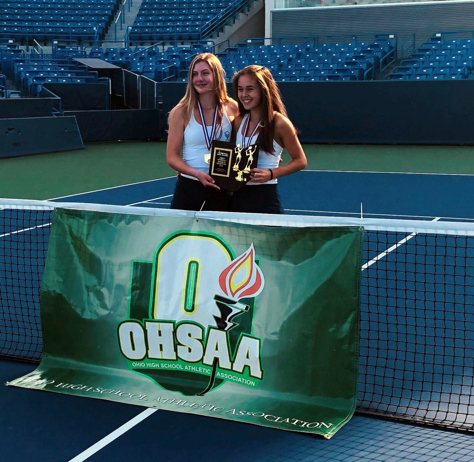 The Oakwood doubles team of Sarah Hall (left) and Natalie Connelly won the Division II state title Saturday at the Lindner Family Tennis Center in Mason. OHSAA photo