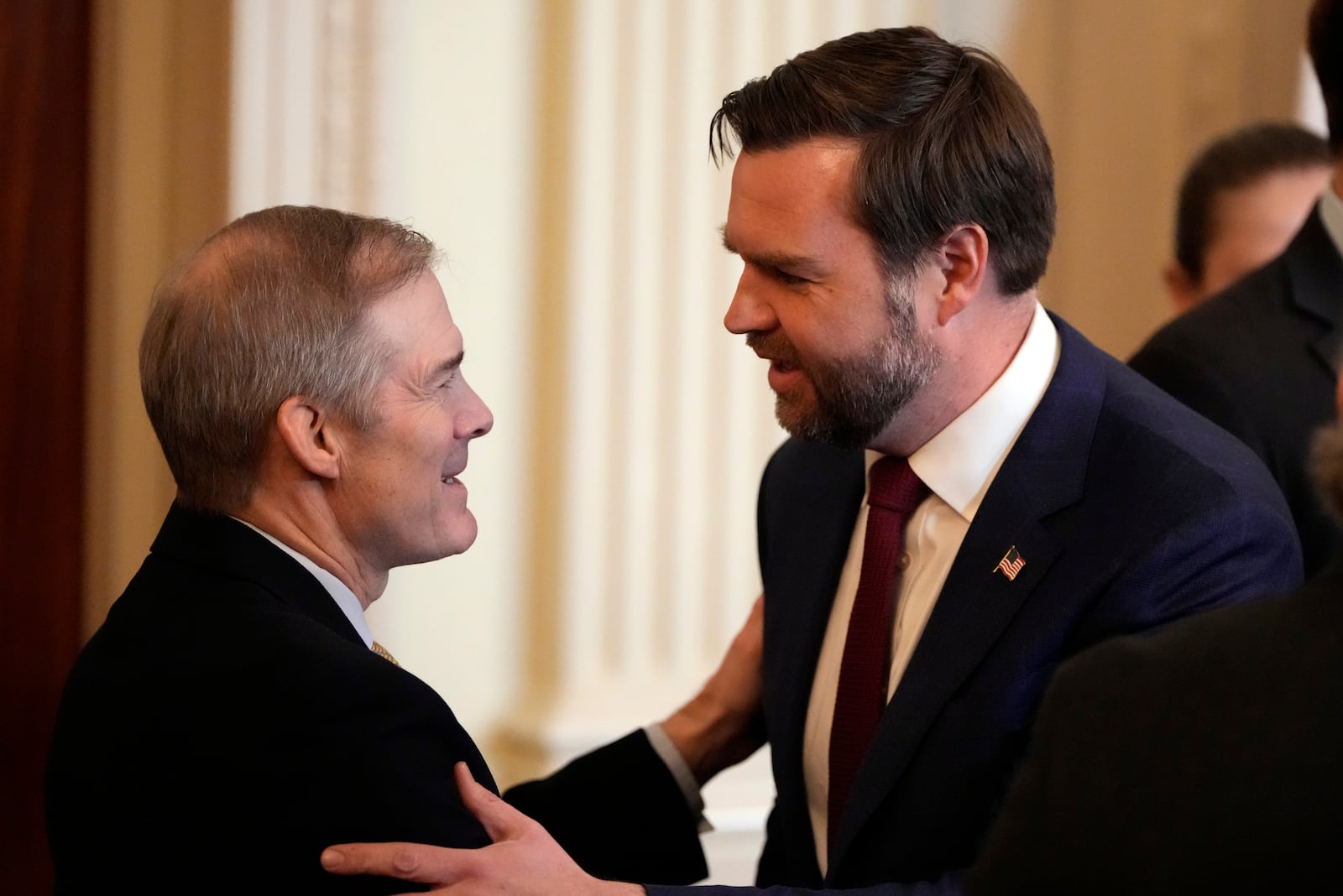 Vice President JD Vance greets Rep. Jim Jordan, R-Ohio, before President Donald Trump signs the Laken Riley Act in the East Room of the White House, Wednesday, Jan. 29, 2025, in Washington. (AP Photo/Alex Brandon)