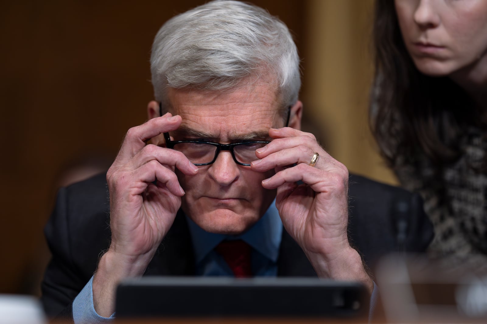 Sen. Bill Cassidy, R-La., keeps his decision until the final moment as the Senate Finance Committee holds a roll call vote to approve the nomination of Robert F. Kennedy Jr. to lead the Health and Human Services Department, at the Capitol in Washington, Tuesday, Feb. 4, 2025. (AP Photo/J. Scott Applewhite)