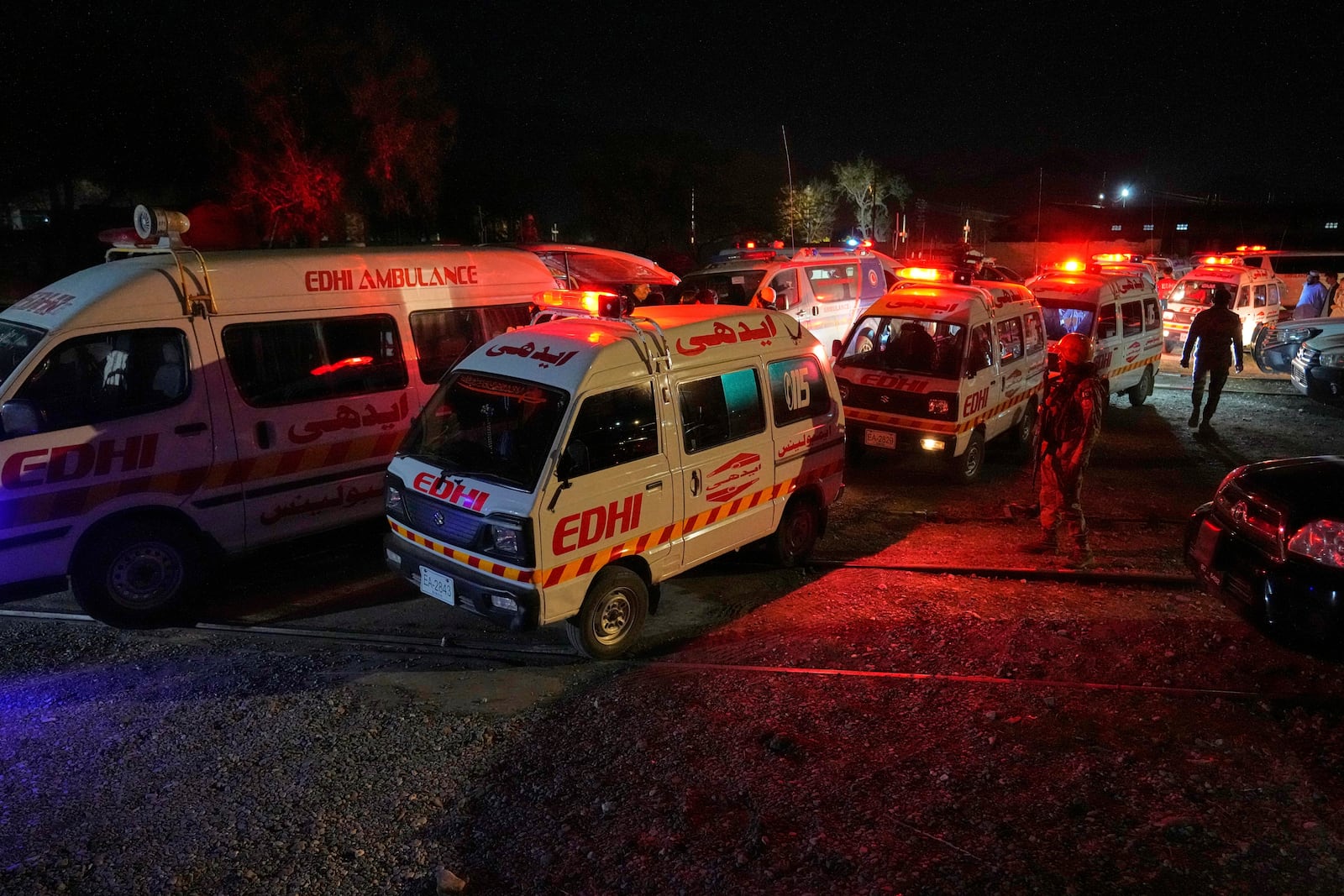 Ambulances carrying wounded survivors rescued by security forces from a passenger train attacked by insurgents leave a railway station in Much, Pakistan's southwestern Balochistan province, Wednesday, March 12, 2025. (AP Photo/Anjum Naveed)