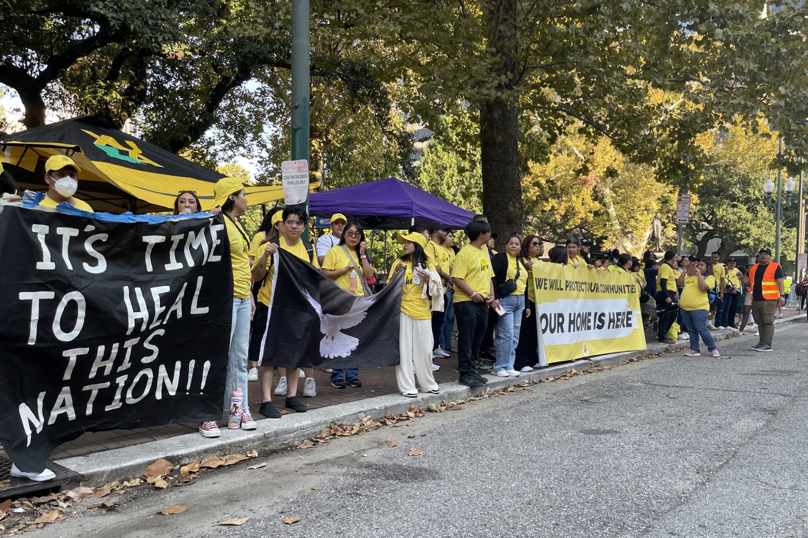 Demonstrators supporting Biden Administration efforts to protect immigrants brought to the U.S. illegally when they were children hold signs in front of the federal appeals court in New Orleans on Thursday, Oct 19, 2924. (AP Photo/Kevin McGill)