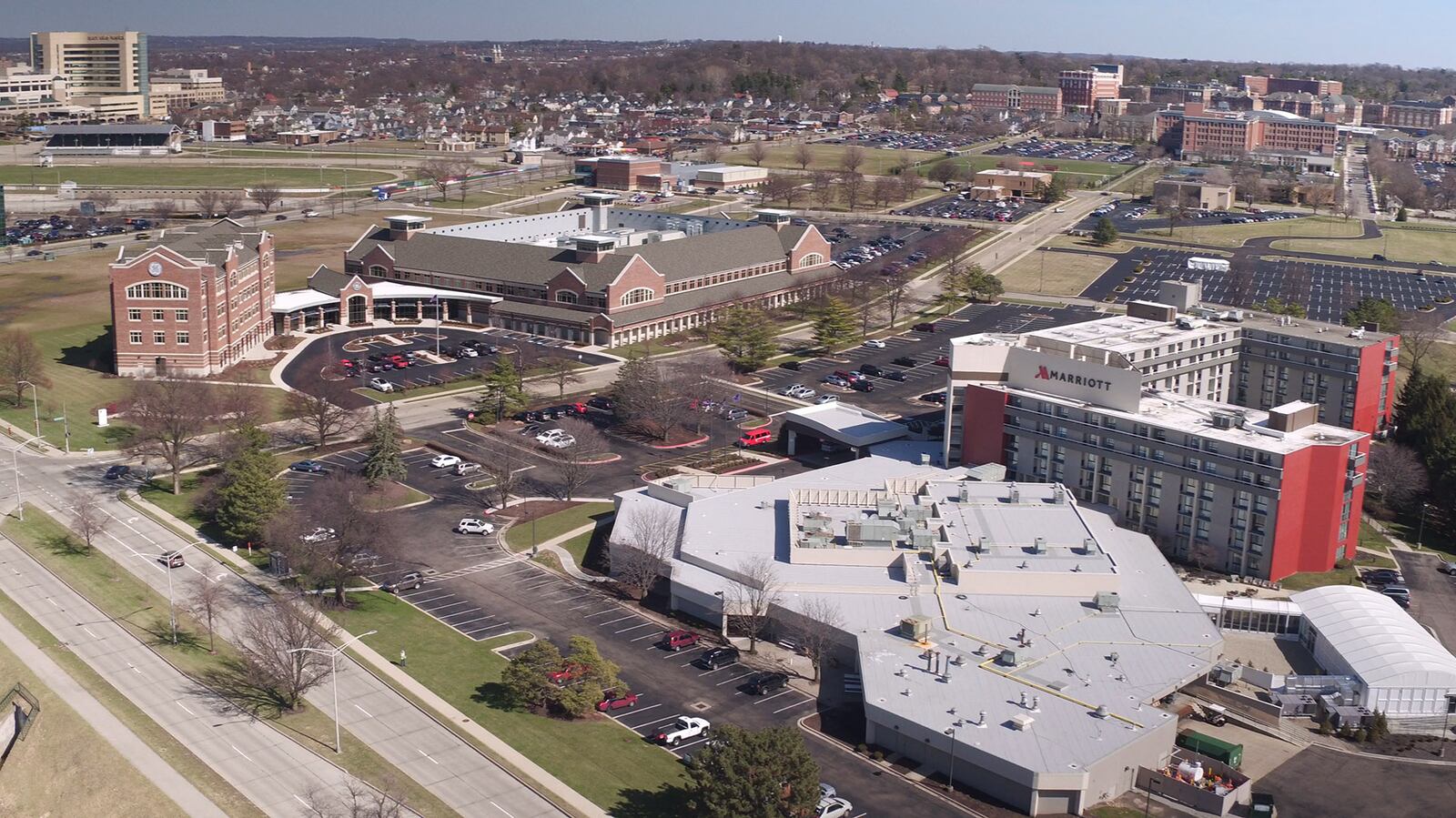 Nearly eight years after the University of Dayton purchased 115 acres of former NCR land, new businesses have built on the land and UD has renovated, filled and renamed the NCR Headquarters as University of Dayton River Campus.  The next big step for the area is rebuilding the old Montgomery County Fairgrounds.    TY GREENLEES / STAFF