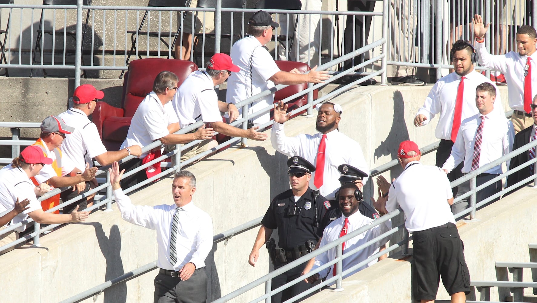 Photos: Urban Meyer jogs across field at Ohio Stadium