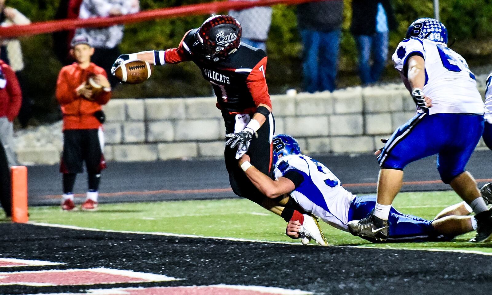 Franklin’s Jared Kinzer finds his way into the end zone during Thursday night’s game against Brookville at Atrium Stadium in Franklin. NICK GRAHAM/STAFF