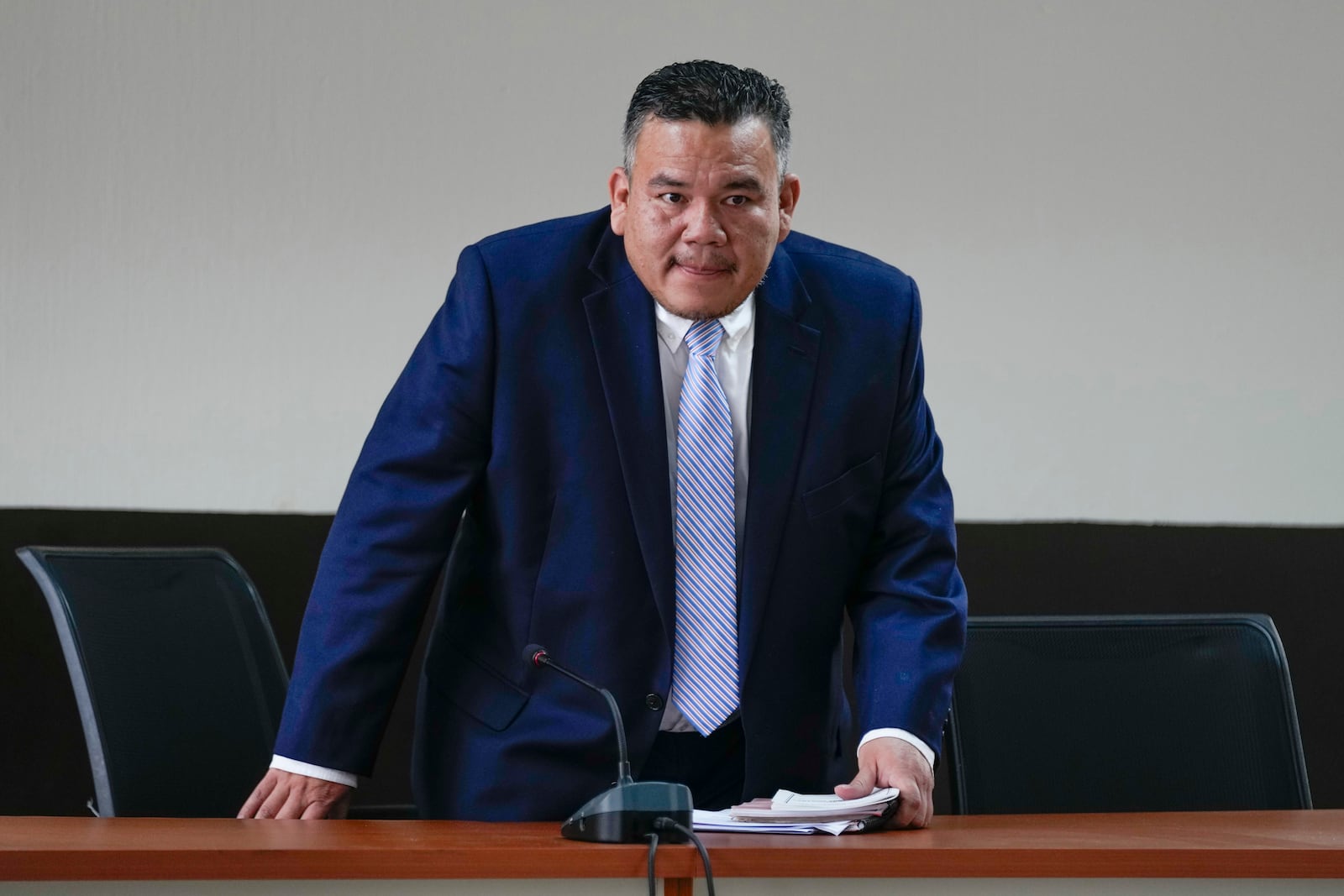 Judge Erick Garcia Alvarado arrives to a courtroom for a hearing requested by Guatemalan journalist Jose Ruben Zamora, founder of El Periodico newspaper, jailed for more than two years on money laundering charges, in Guatemala City, Friday, Oct. 18, 2024. (AP Photo/Moises Castillo)