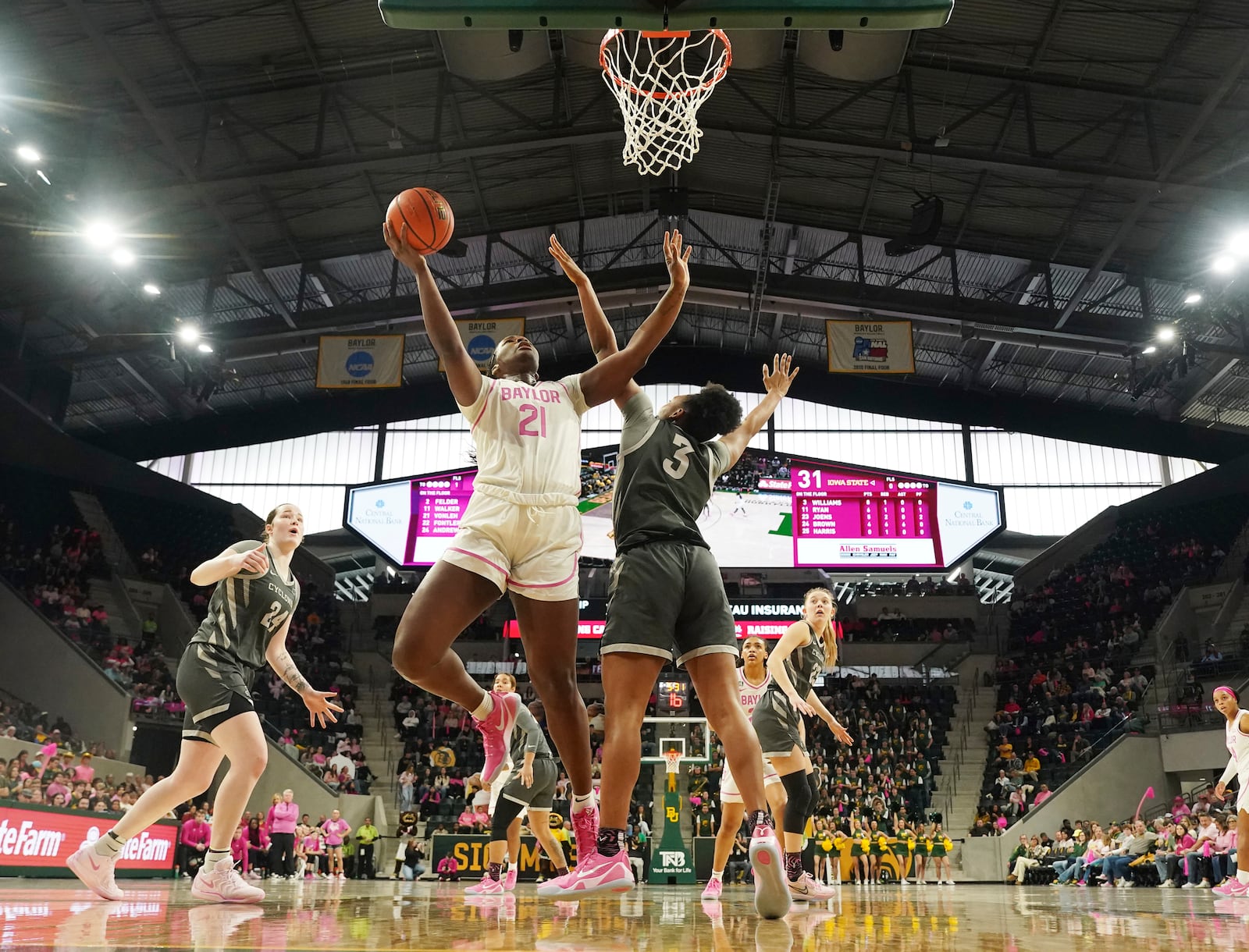 Baylor center Aaronette Vonleh scores against Iowa State forward Alisa Williams in the second half of an NCAA college basketball game, Saturday, Feb. 22, 2025, in Waco, Texas. (Chris Jones/Waco Tribune-Herald via AP)