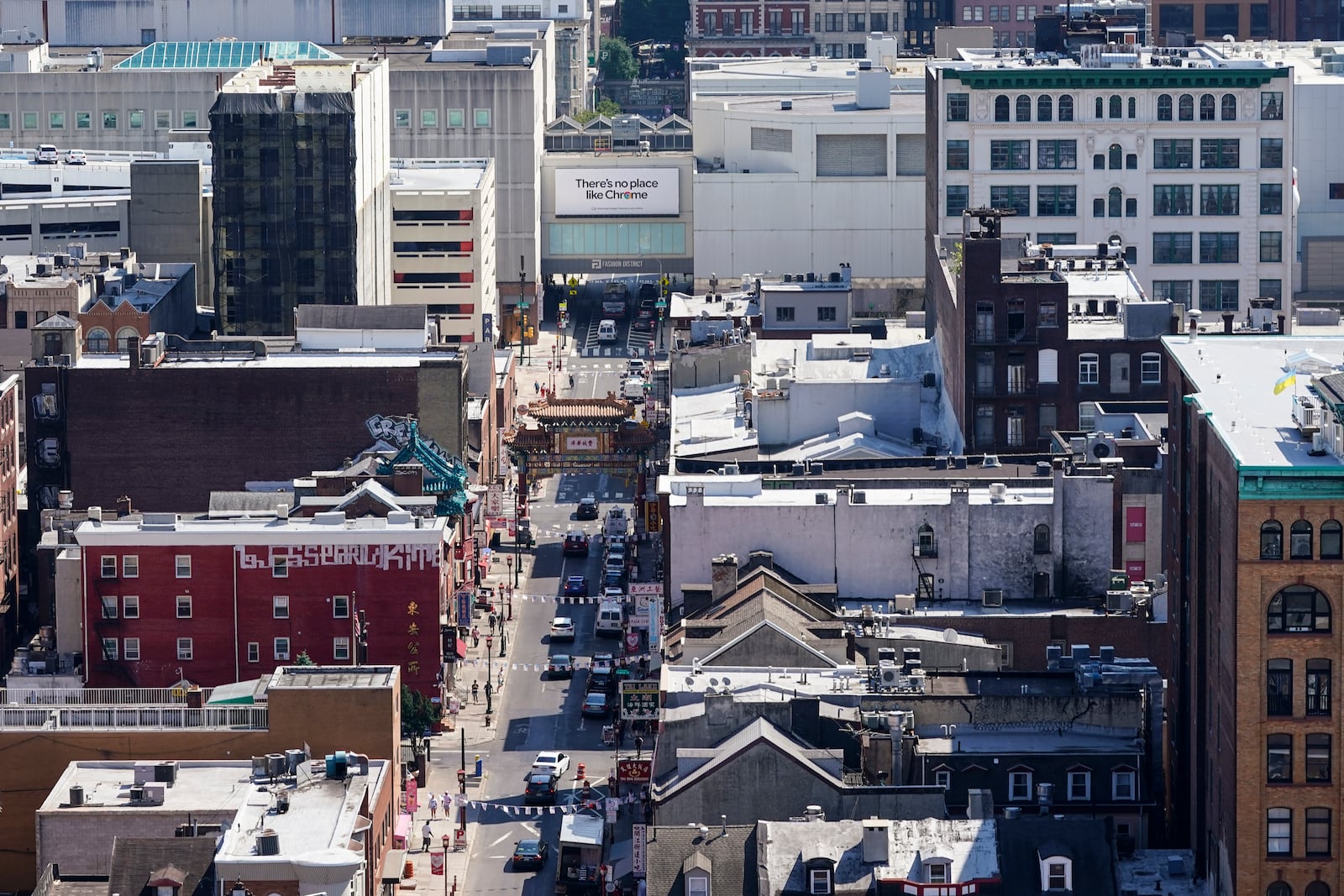 FILE - The Fashion District shopping center, top right, the proposed location of a new Philadelphia 76ers NBA basketball arena, stands near the Chinatown neighborhood in Philadelphia, July 22, 2022. (AP Photo/Matt Rourke, File)