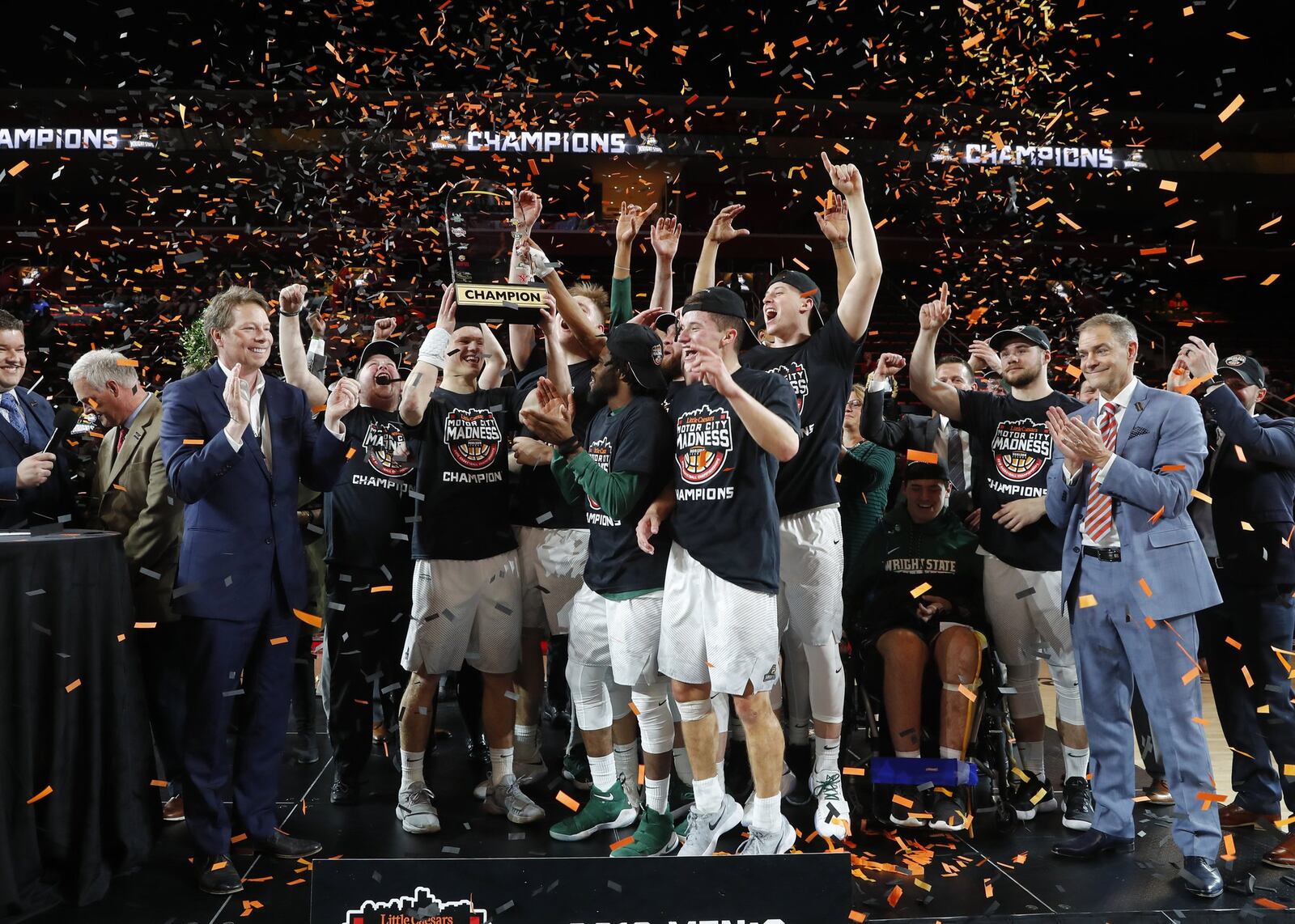 Wright State players celebrate their 74-57 win against Cleveland State after an NCAA basketball game in the Horizon League tournament championship in Detroit, Tuesday, March 6, 2018. (AP Photo/Paul Sancya)