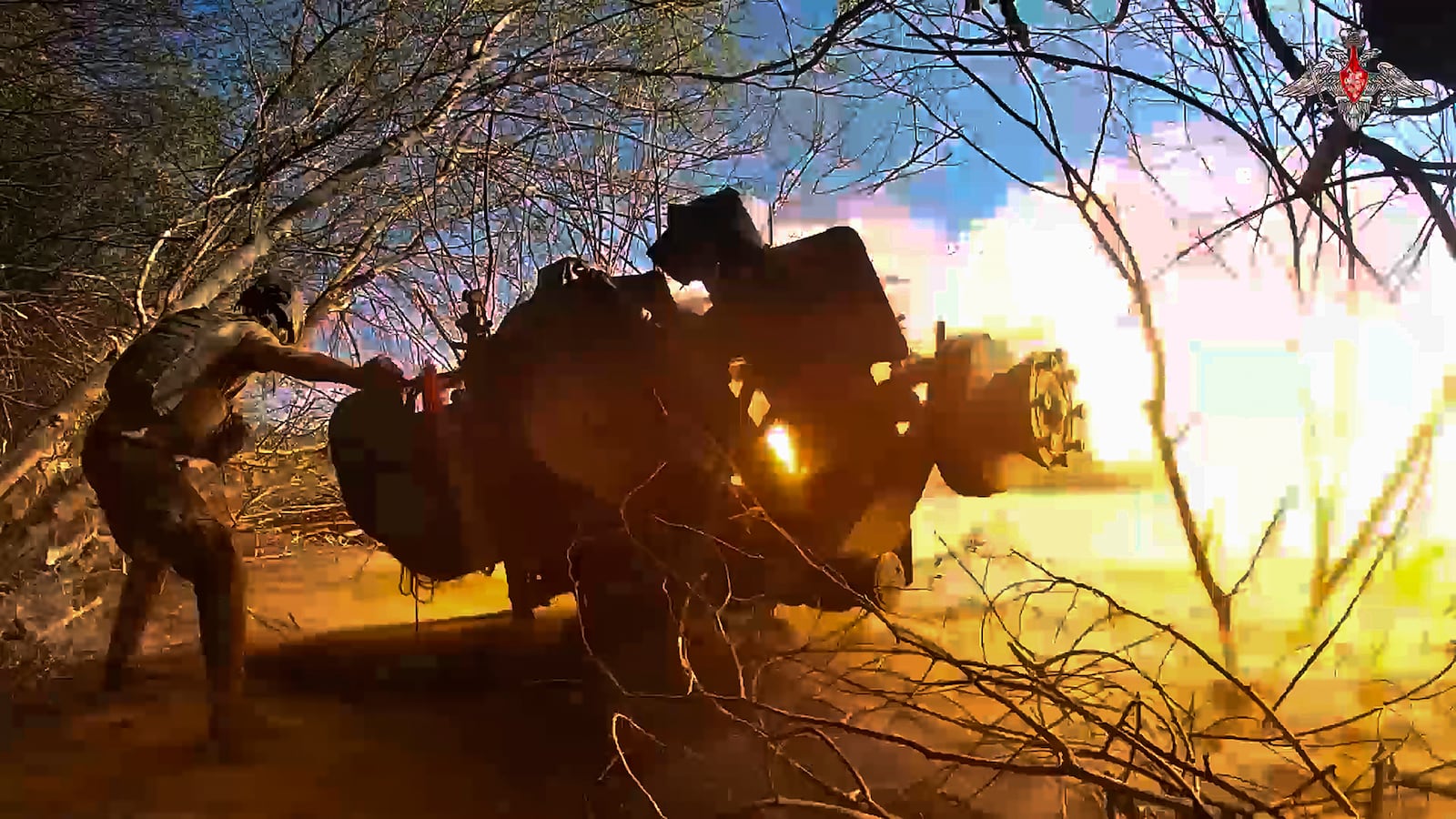 FILE - In this image from video released by the Russian Defense Ministry on Oct. 17, 2024, a Russian soldier fires a gun toward a Ukrainian position in the Russian-Ukrainian border area in the Kursk region, Russia. (Russian Defense Ministry Press Service photo via AP, File)