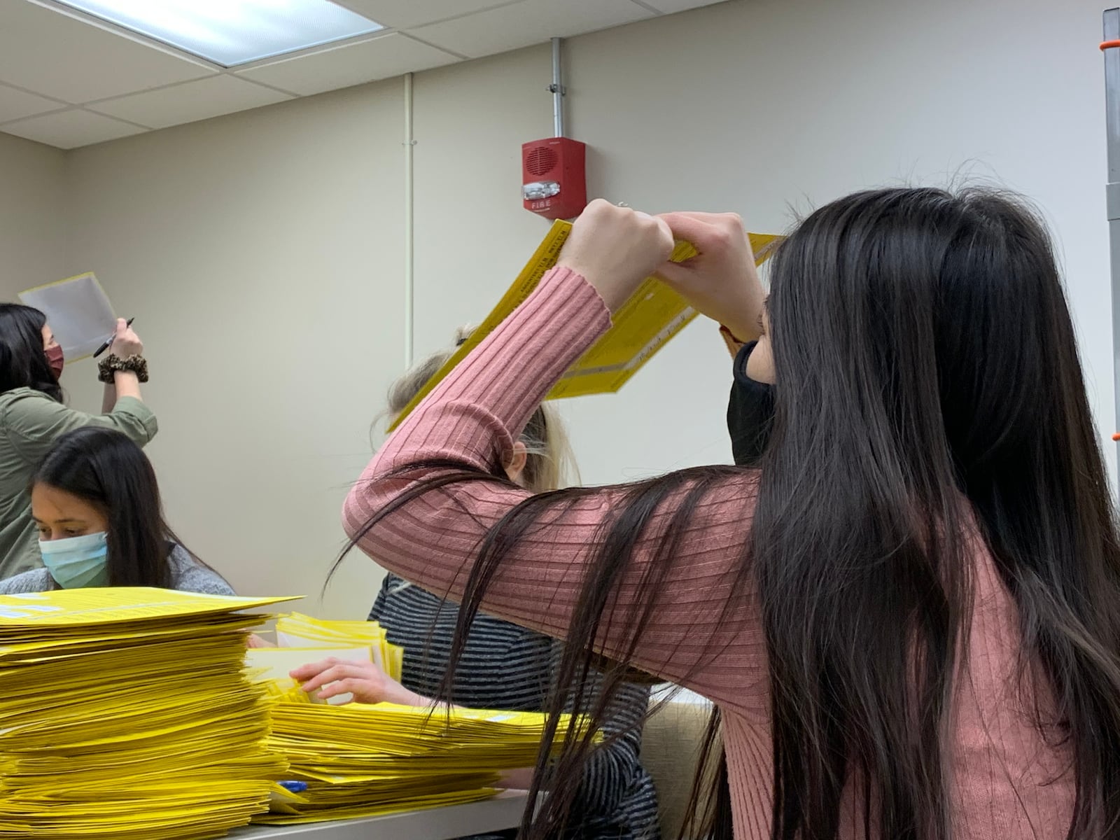 Montgomery County Board of Elections staff sort provisional ballots on Tuesday night. Josh Sweigart/Staff