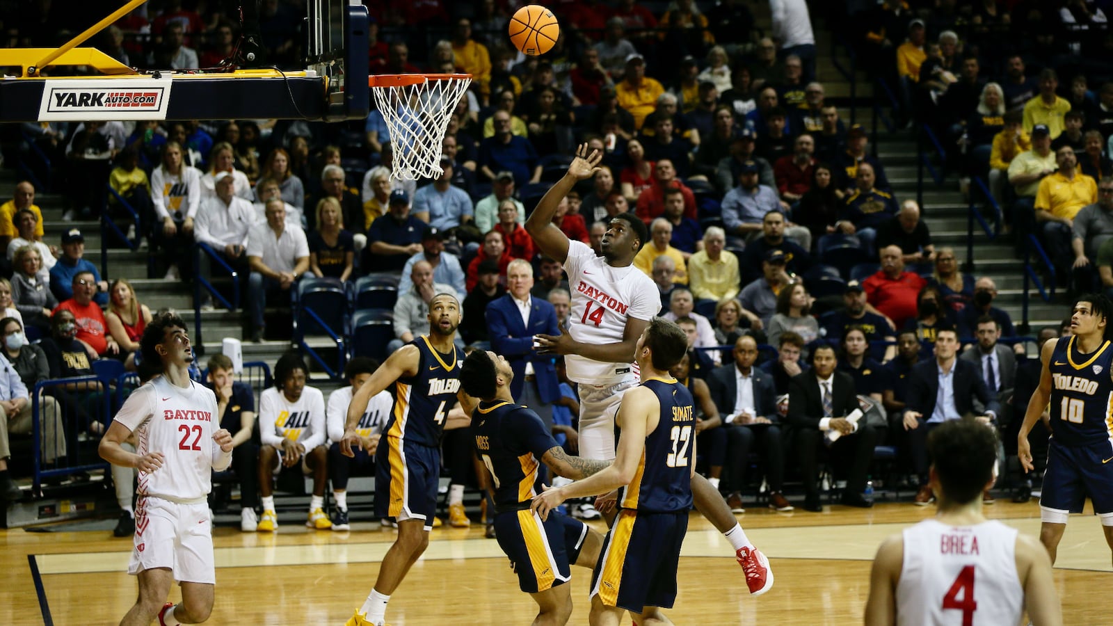 Dayton's Moulaye Sissoko scores against Toledo in the first round of the NIT on Wednesday, March 16, 2022, at Savage Arena in Toledo. David Jablonski/Staff