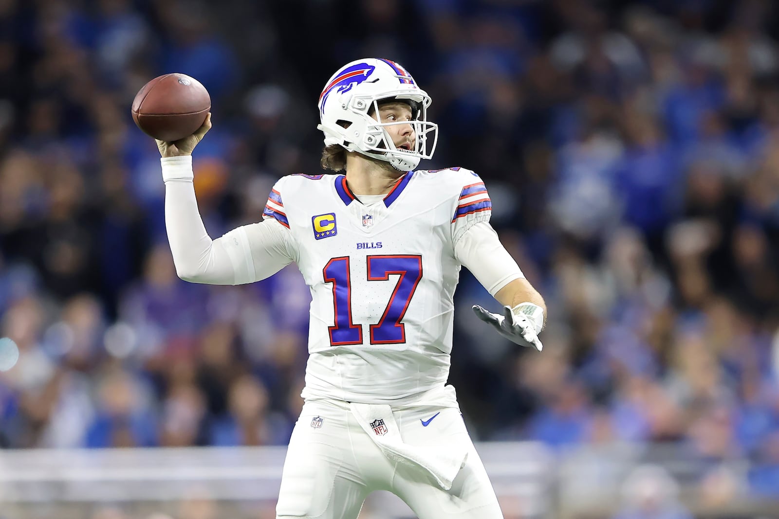 Buffalo Bills quarterback Josh Allen (17) passes against the Detroit Lions during the first half of an NFL football game, Sunday, Dec. 15, 2024, in Detroit. (AP Photo/Rey Del Rio)