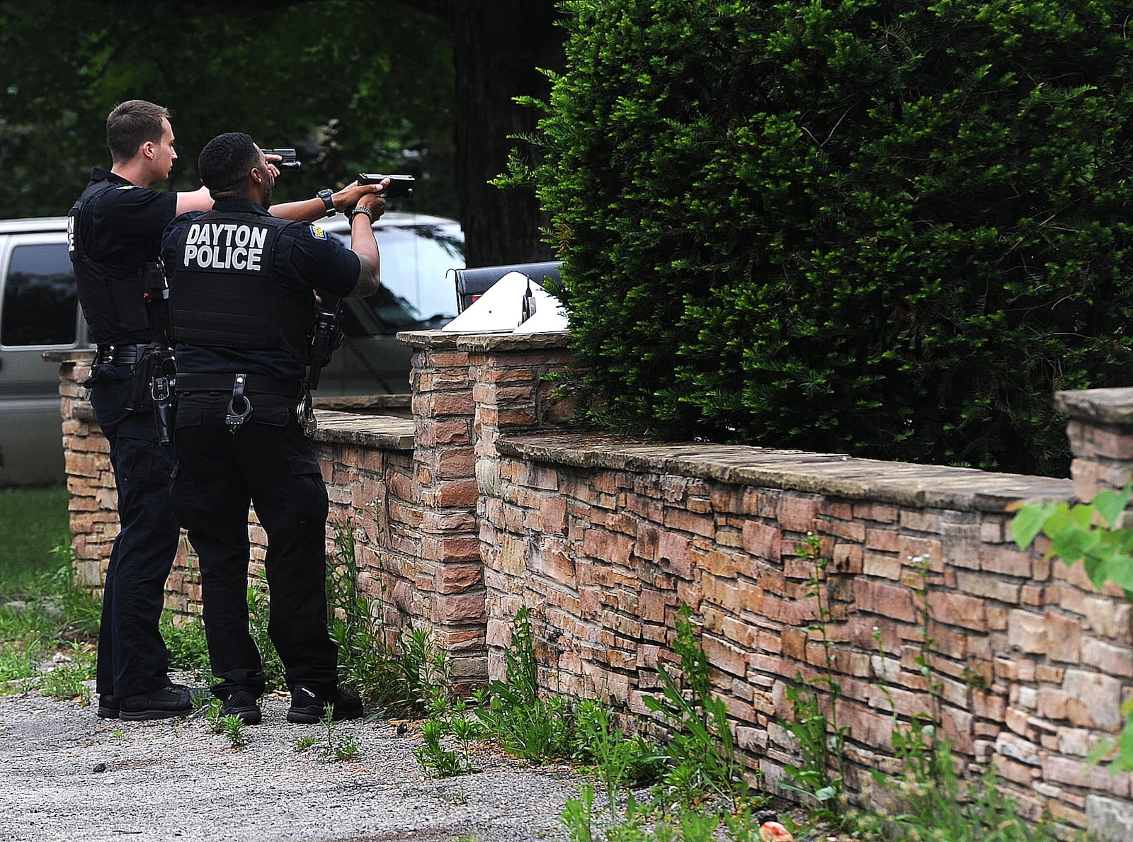 Montgomery County sheriff's deputies and Dayton police held a juvenile at gun point after he was seen running through a neighborhood near North Dixie Drive with a handgun Monday morning June 19, 2023. The juvenile was apprehended hiding in a garden behind a house on Ridge Road. MARSHALL GORBY\STAFF