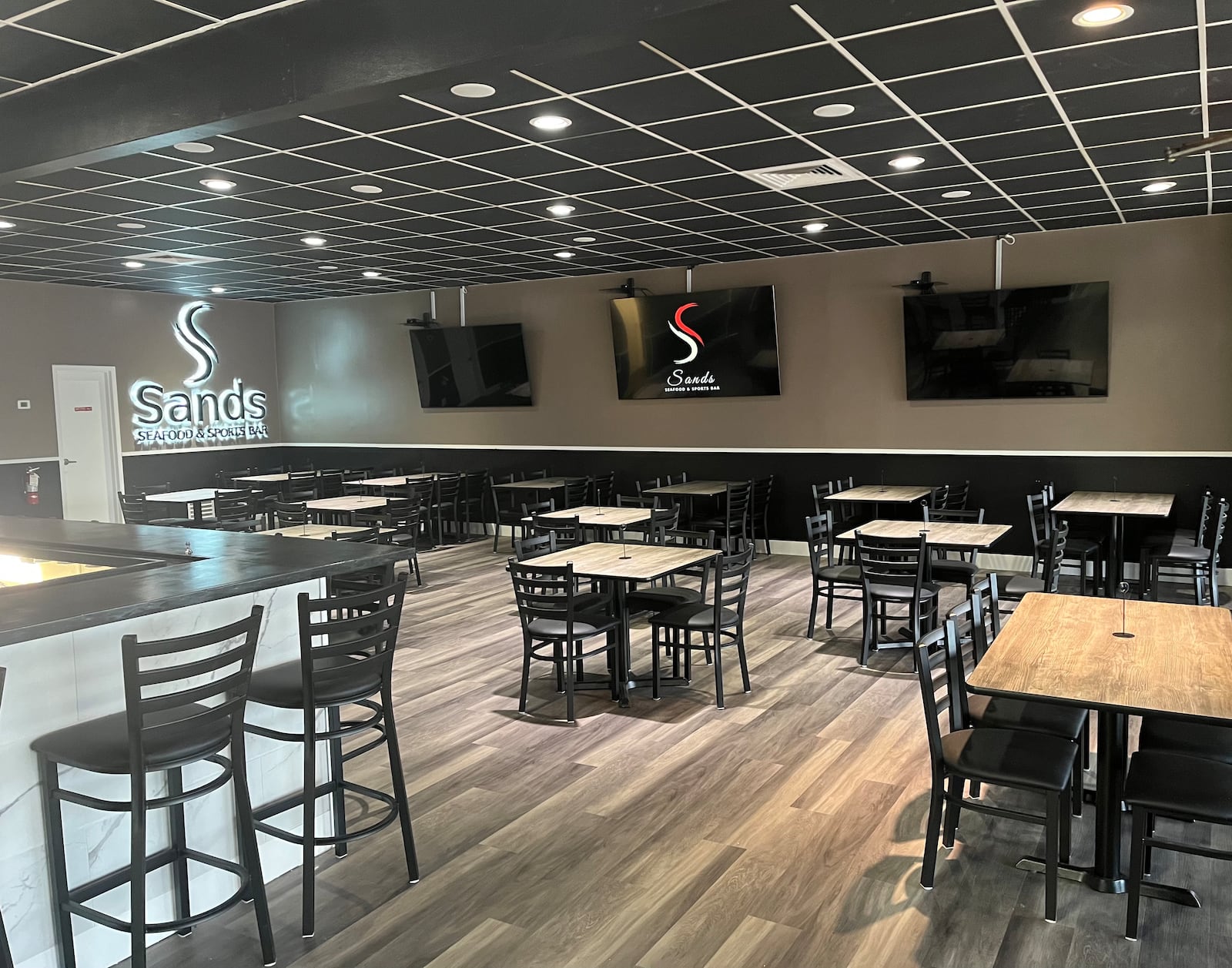 Sands Seafood and Sports Bar plans to offer the best of both worlds with a cross between a sports bar and a high-dining experience when it opens in August. CONTRIBUTED