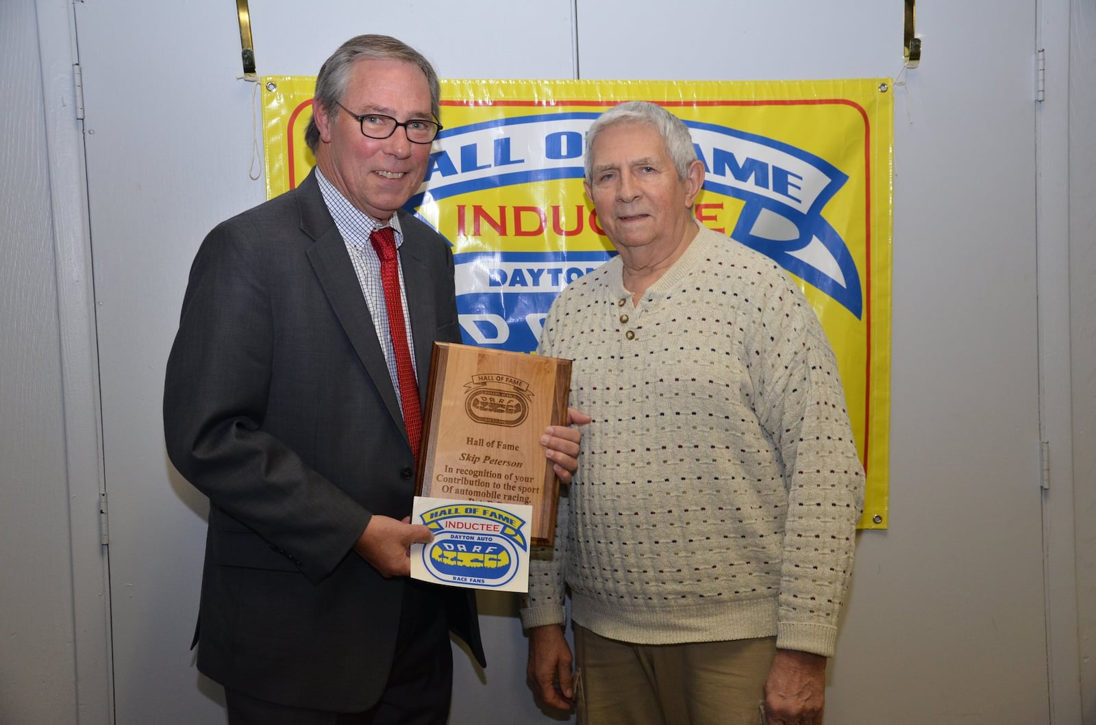 Longtime Dayton-area racing supporter Jerry Wahl, right, inducted Skip Peterson into the media category of the Dayton Area Racing Fan Club Hall of Fame on Nov. 25, 2014, at the Celebrations Banquet Hall in Vandalia. Photo contributed by Isaacs Photography