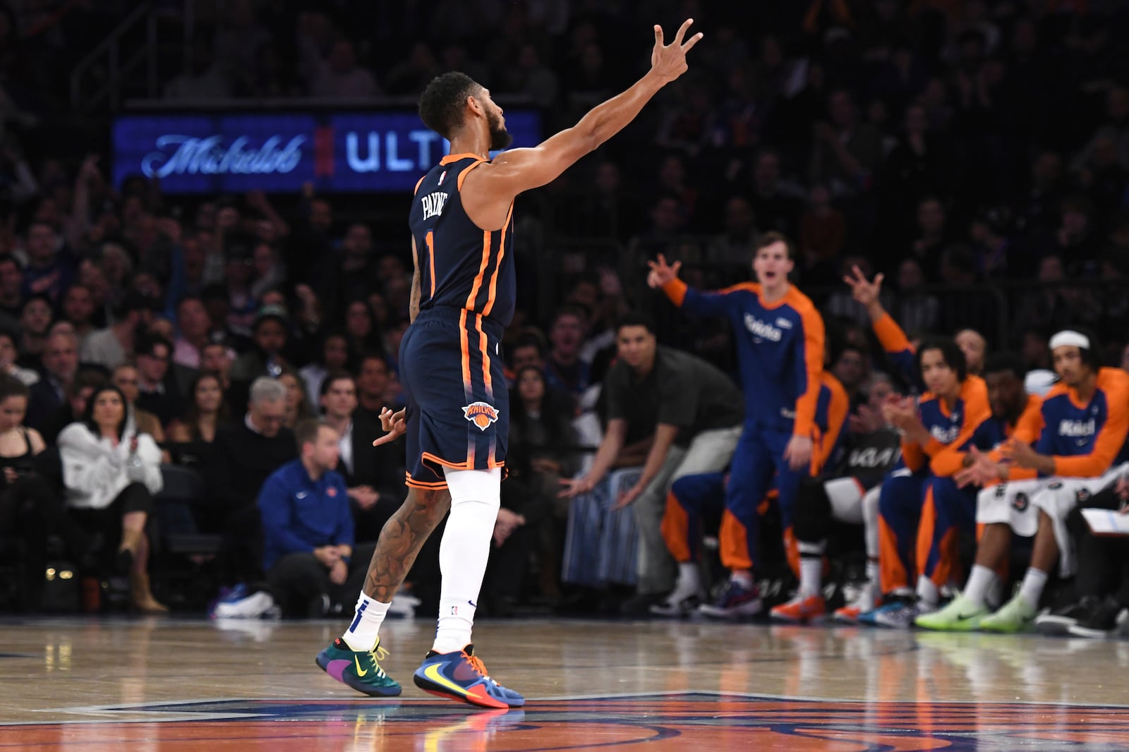 New York Knicks' Cameron Payne reacts after scoring a three-pointer during the first half of an NBA basketball game against the Cleveland Cavaliers, Monday, Oct. 28, 2024, in New York. (AP Photo/Pamela Smith)