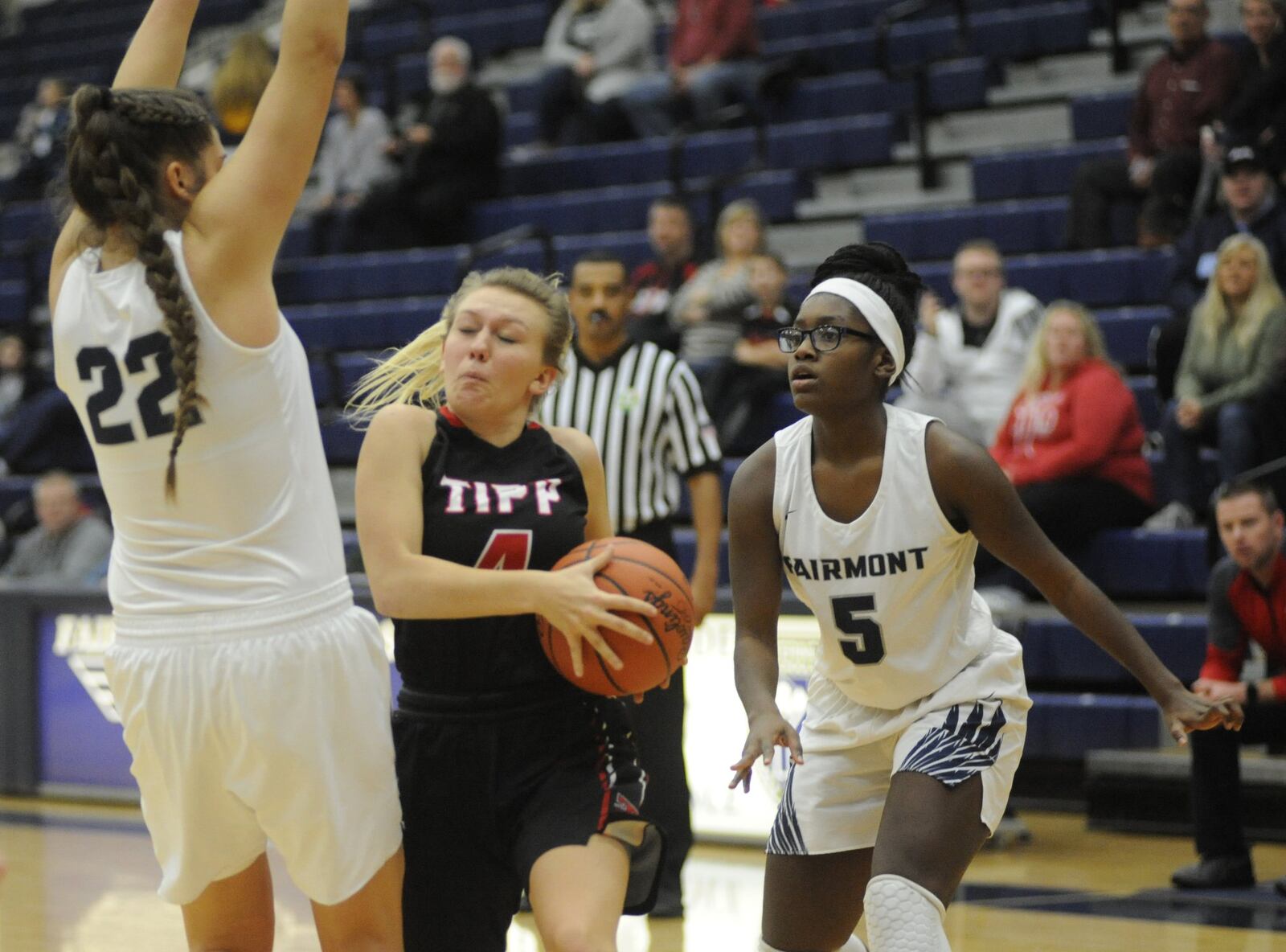 Mackenzie Smith of Tippecanoe (with ball) is checked by Fairmont’s Madison Bartley (left) and Kerra Thornton. Fairmont defeated visiting Tipp 55-26 in a girls high school basketball game on Saturday, Dec. 29, 2018. MARC PENDLETON / STAFF